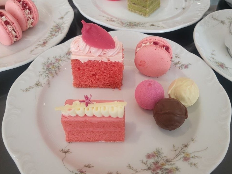 F to B: Rose Layered Cake, Assorted Chocolate Pralines, Lychee Rose Pound Cake, Pink Macaron