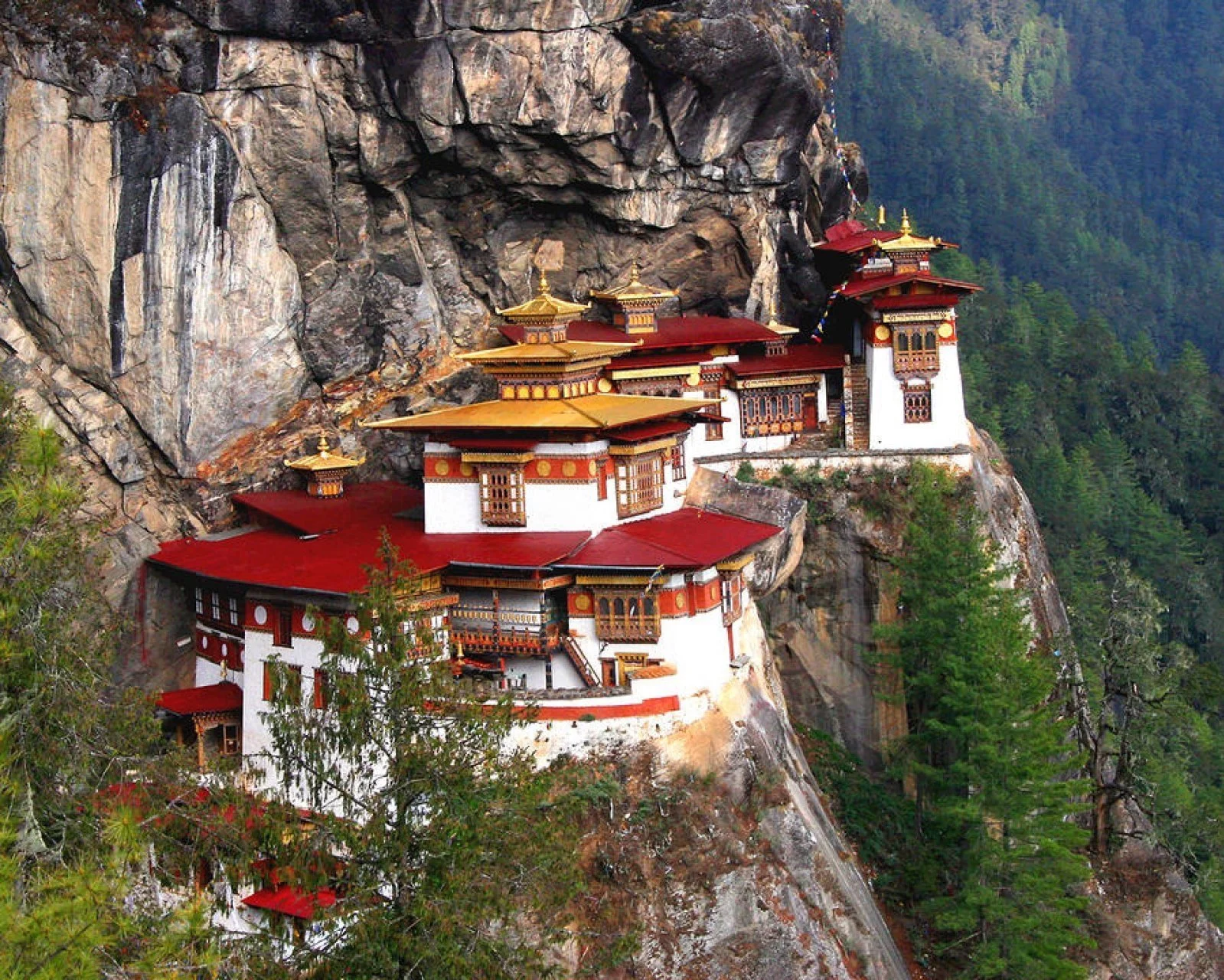 Boutique Tours & Travel - Bhutan Tours A Buddhist monastery built into a mountainside 