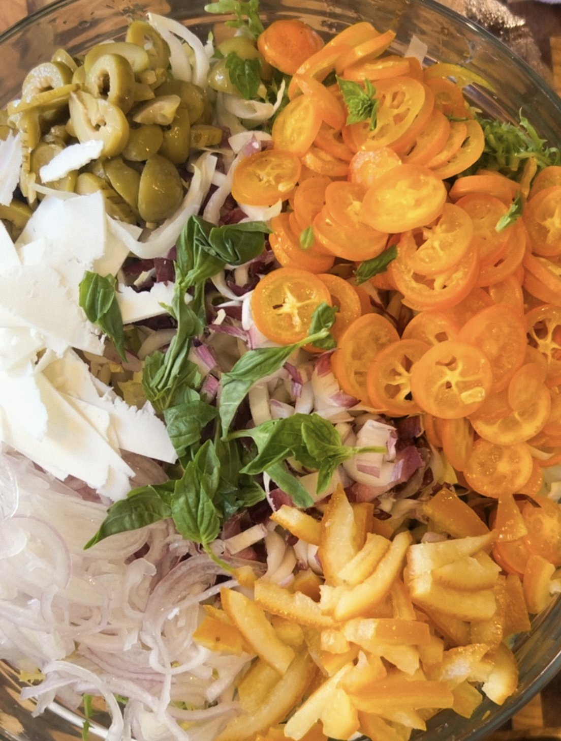 Aperol Salad with Endive, Salted Candied orange, Ricotta Salata, Olive + Kumquat