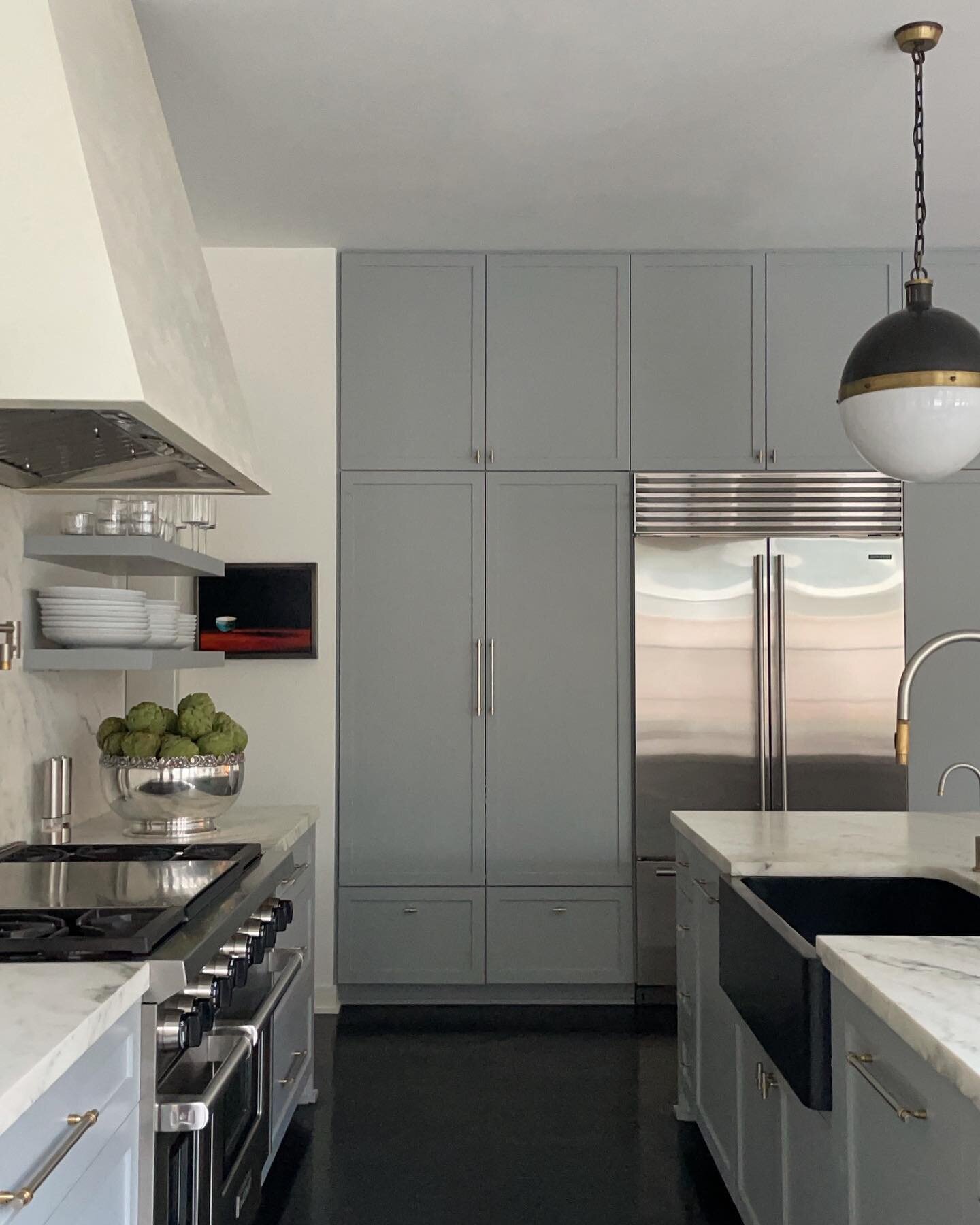 Let the weekend begin&hellip;A calming kitchen space I designed for my mom in Houston - featuring foggy blue cabinetry, danby montclair marble countertops, a plastered hood and a custom black granite apron-front sink. 

.
.
.
.

#kitchen #kitchendesi