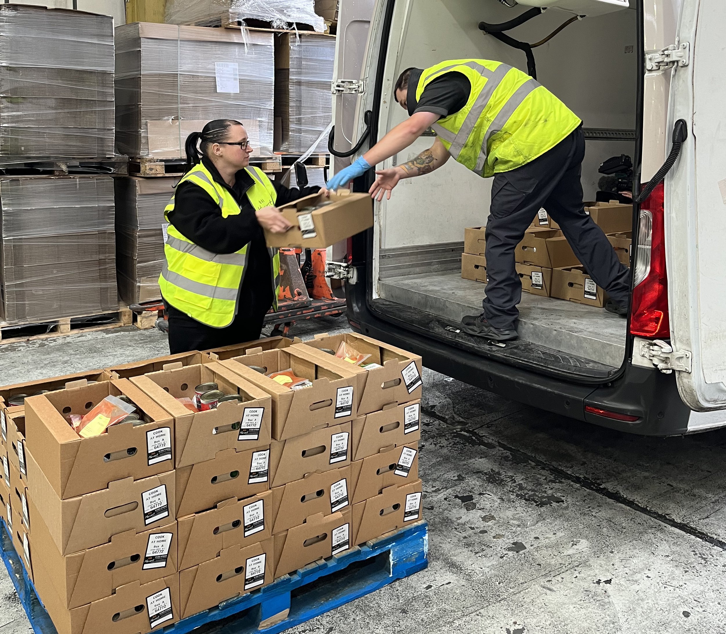 The boxes being loaded into van.jpg