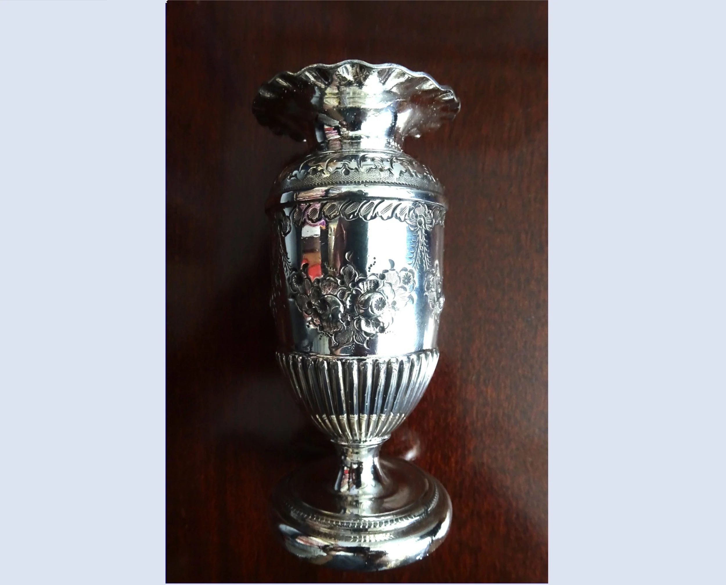 Silver plated vase by James Dixon and Sons.