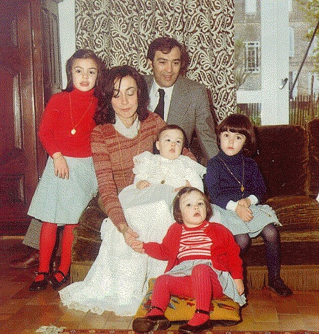 ▴&nbsp;Jean-Michel and young family