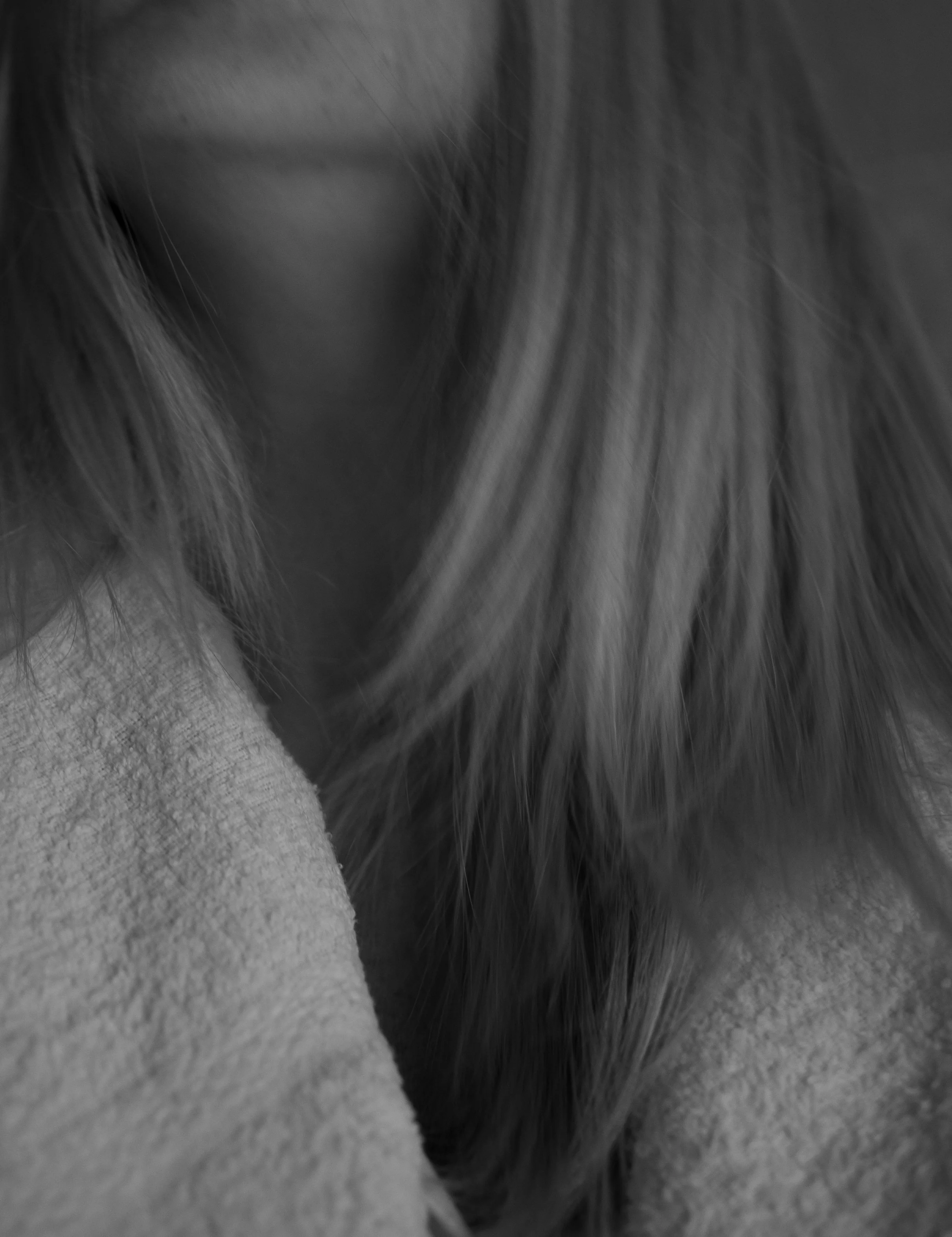 Close up black and white abstract portrait of a woman representing the value of acupuncture support during IVF at Fertile Earth Encinitas