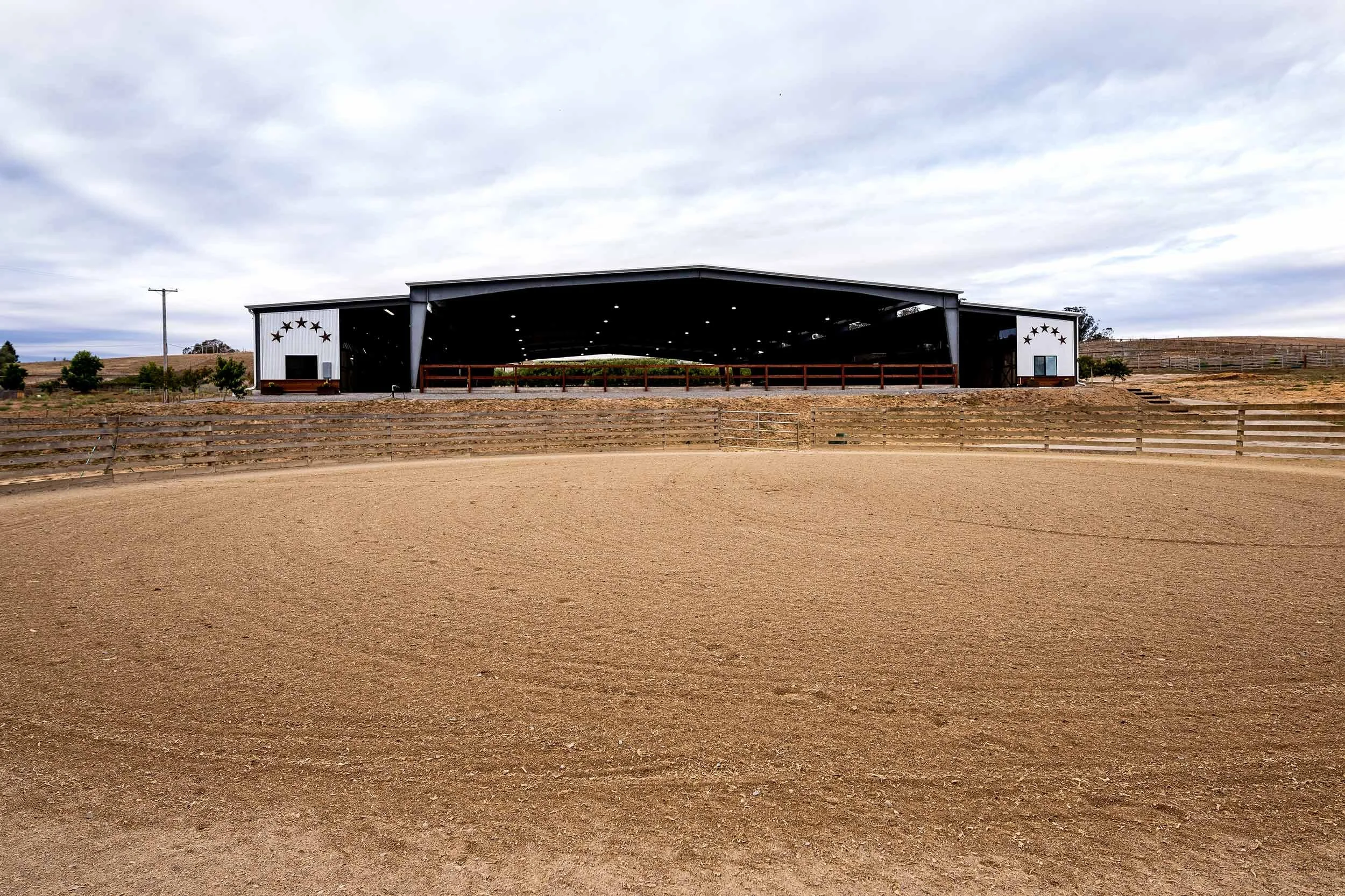 Huge outdoor round pen sitting below the Jaz Creek barn