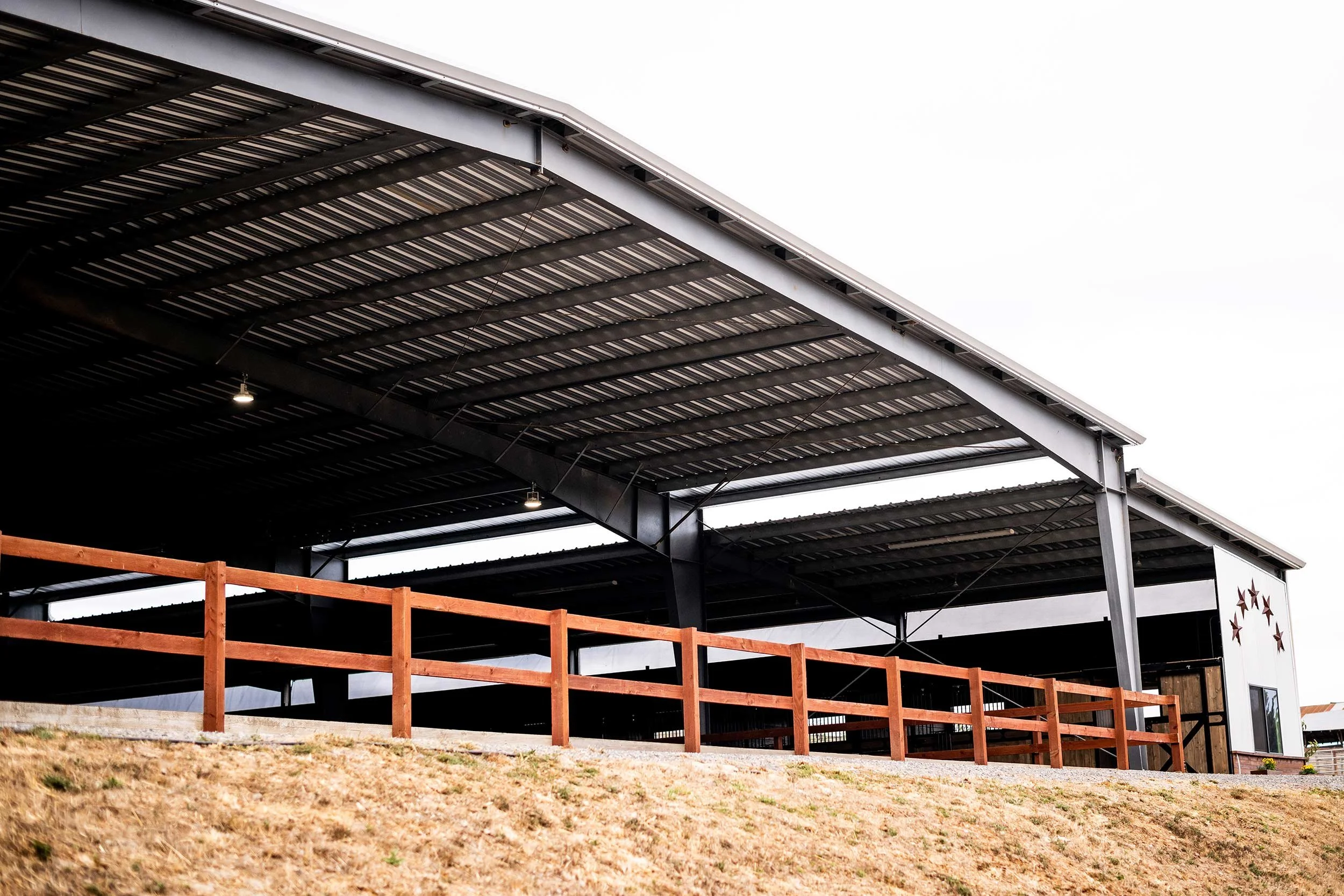 View of the large indoor arena from outside the barn