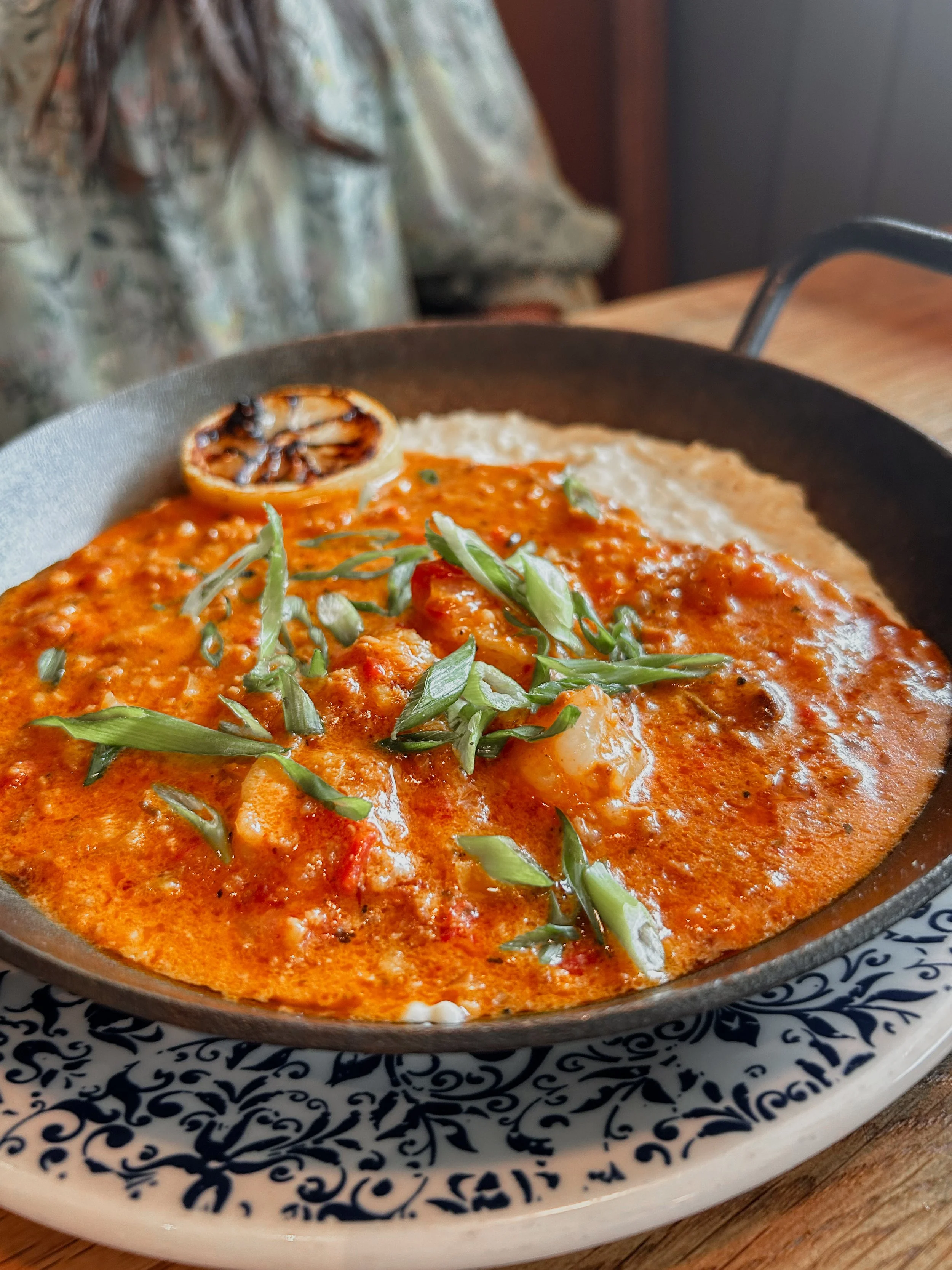 bowl of shrimp and grits from tupelo honey