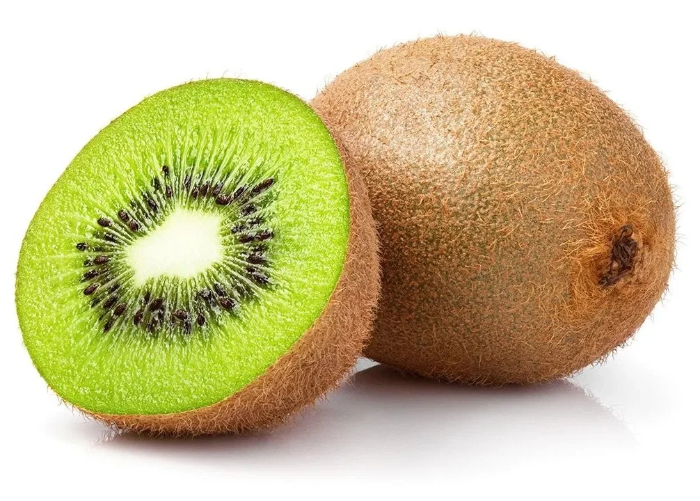 A sliced kiwi fruit showing its green flesh and black seeds, next to a whole kiwi with brown fuzzy skin.