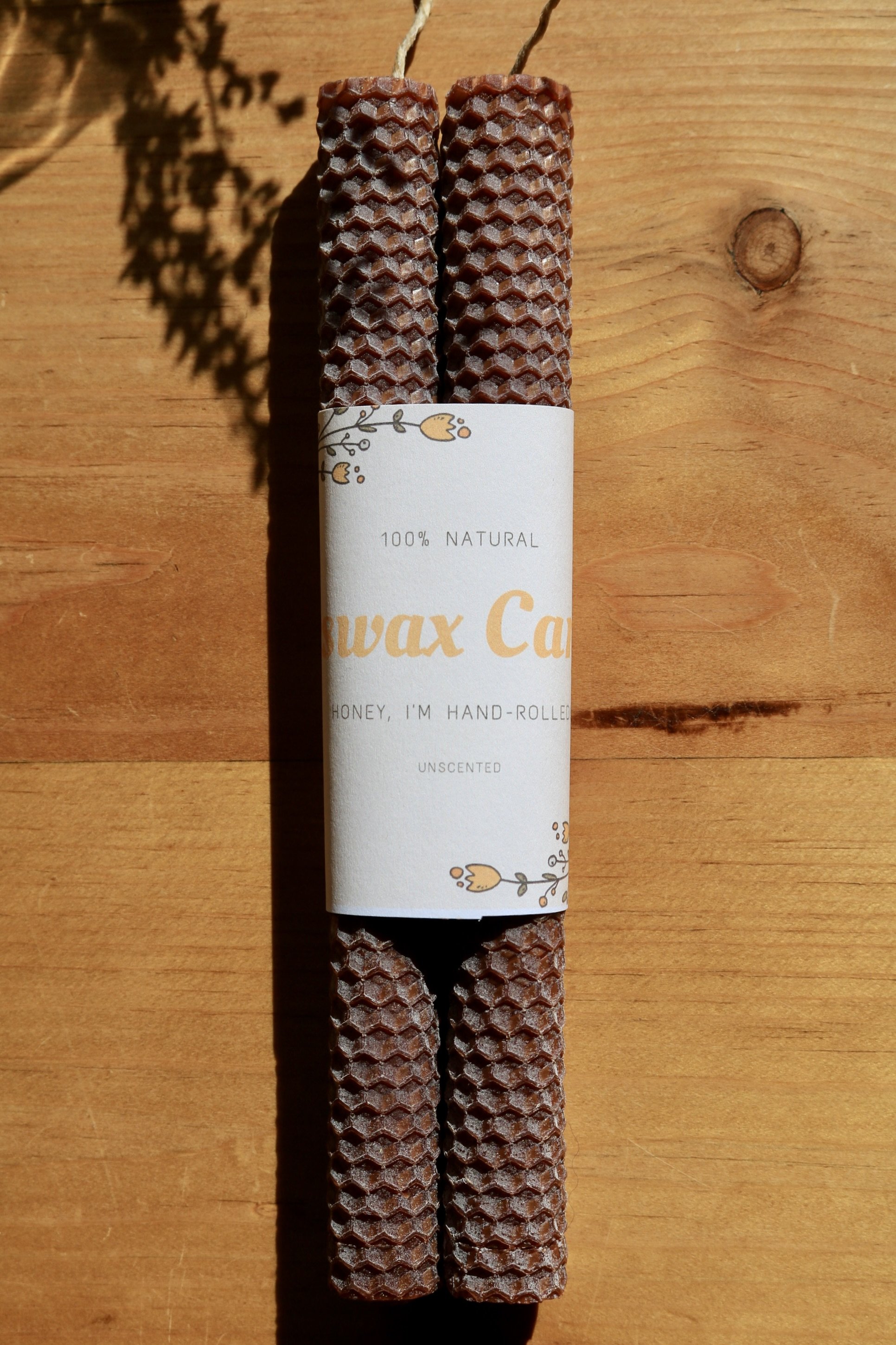 Soil brown hand-rolled honeycomb beeswax candle
