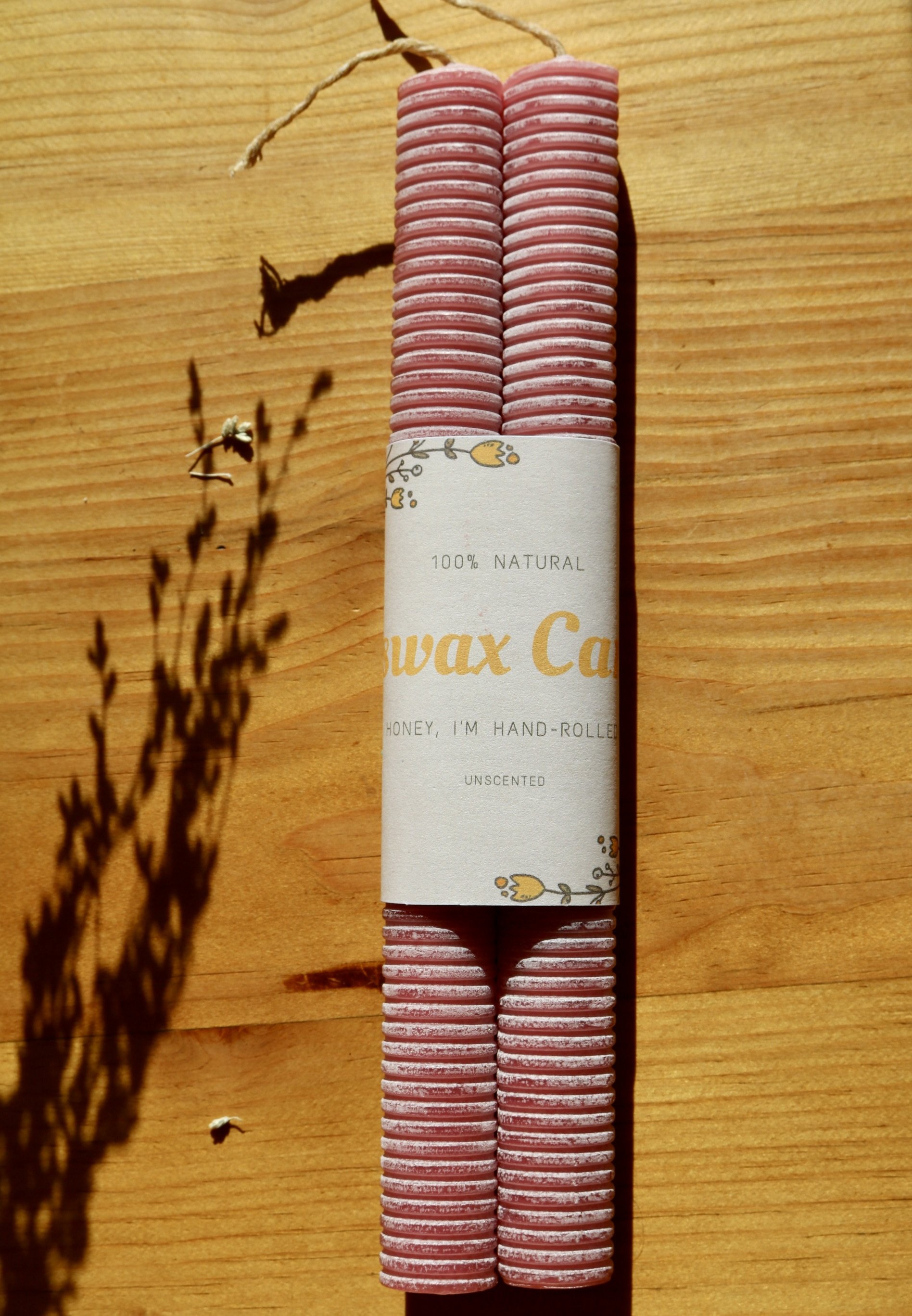 Dusty Rose Pink hand-rolled corrugated beeswax candle
