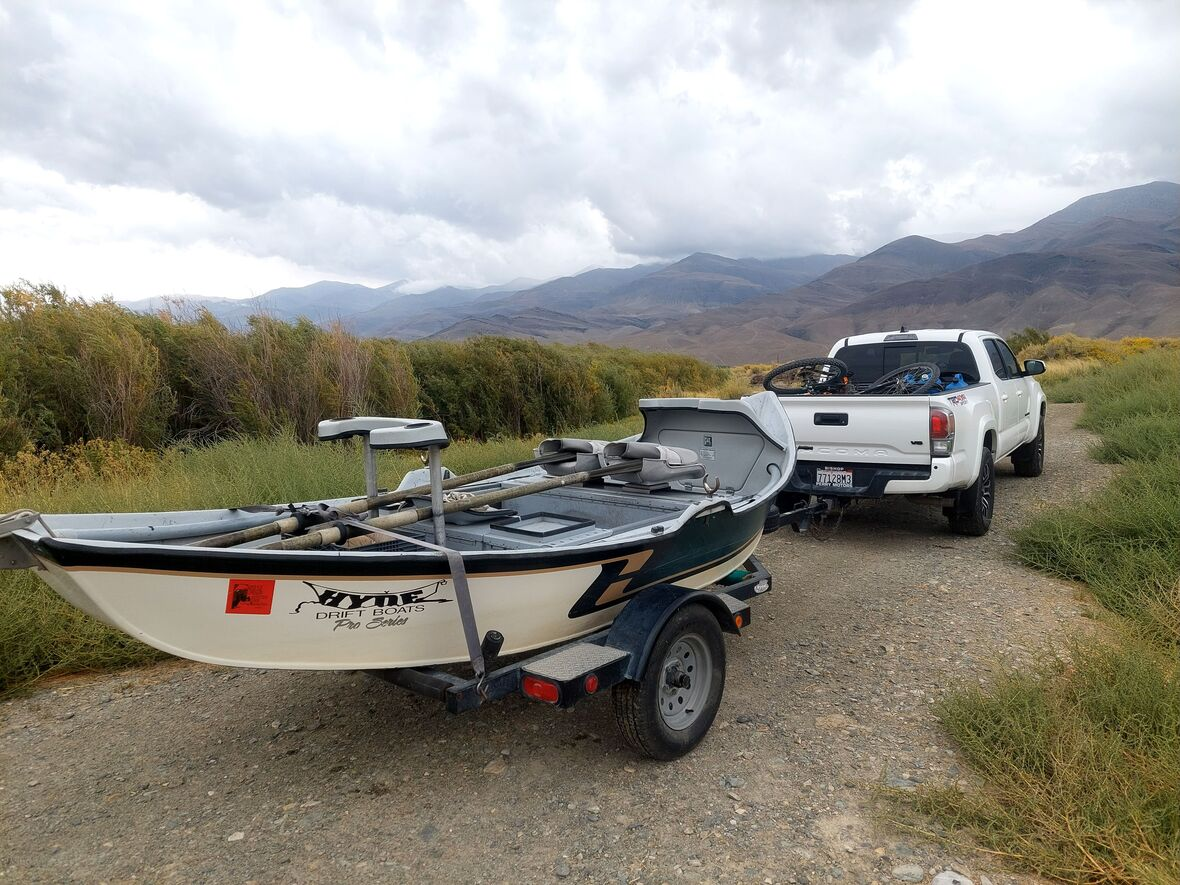 Pat Jaeger’s Fly fishing driftboat beside the Owens River in Bishop California