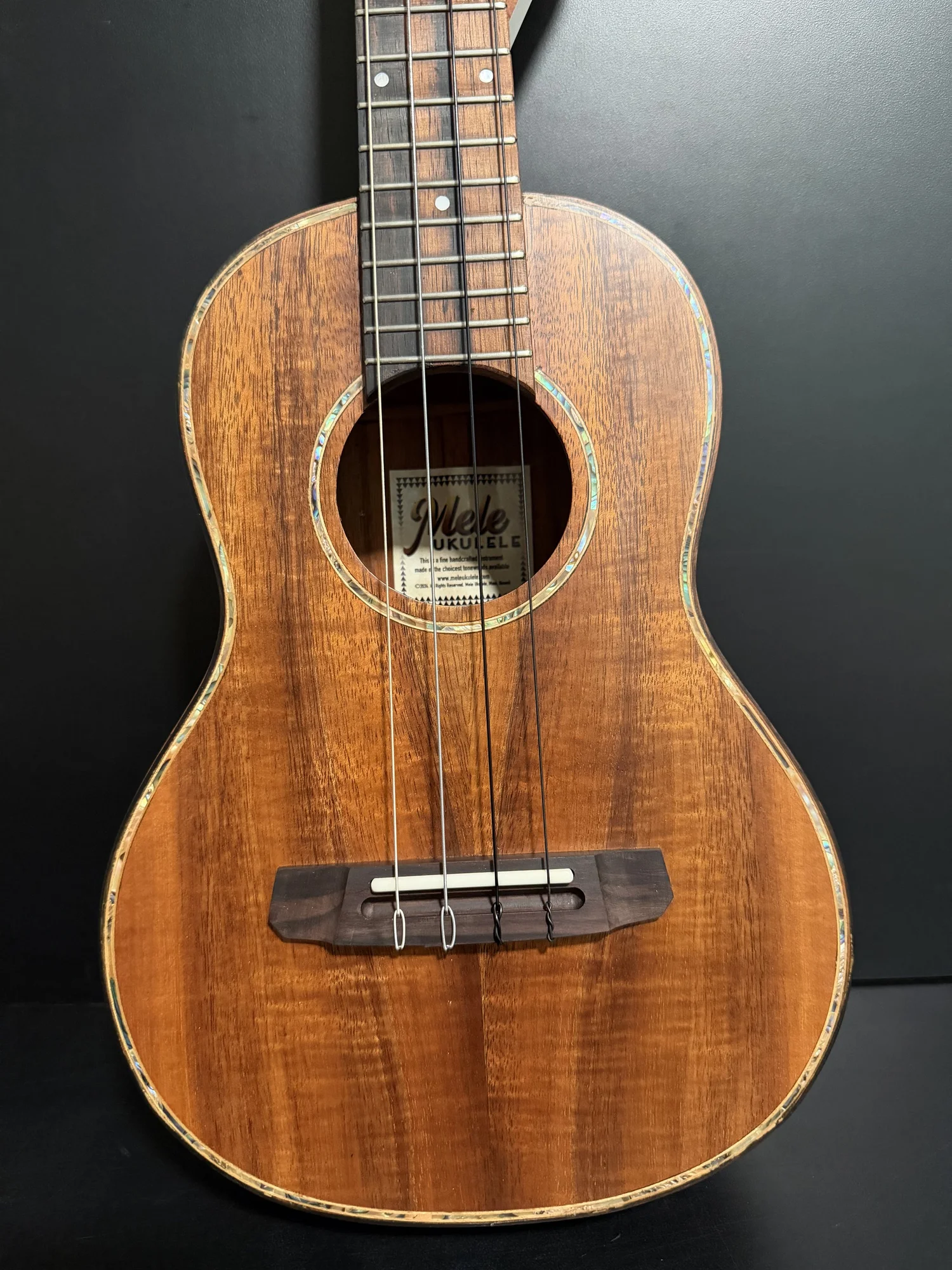 Mele Deluxe Curly Koa Tenor Ukulele with Abalone Shell Inlay 
