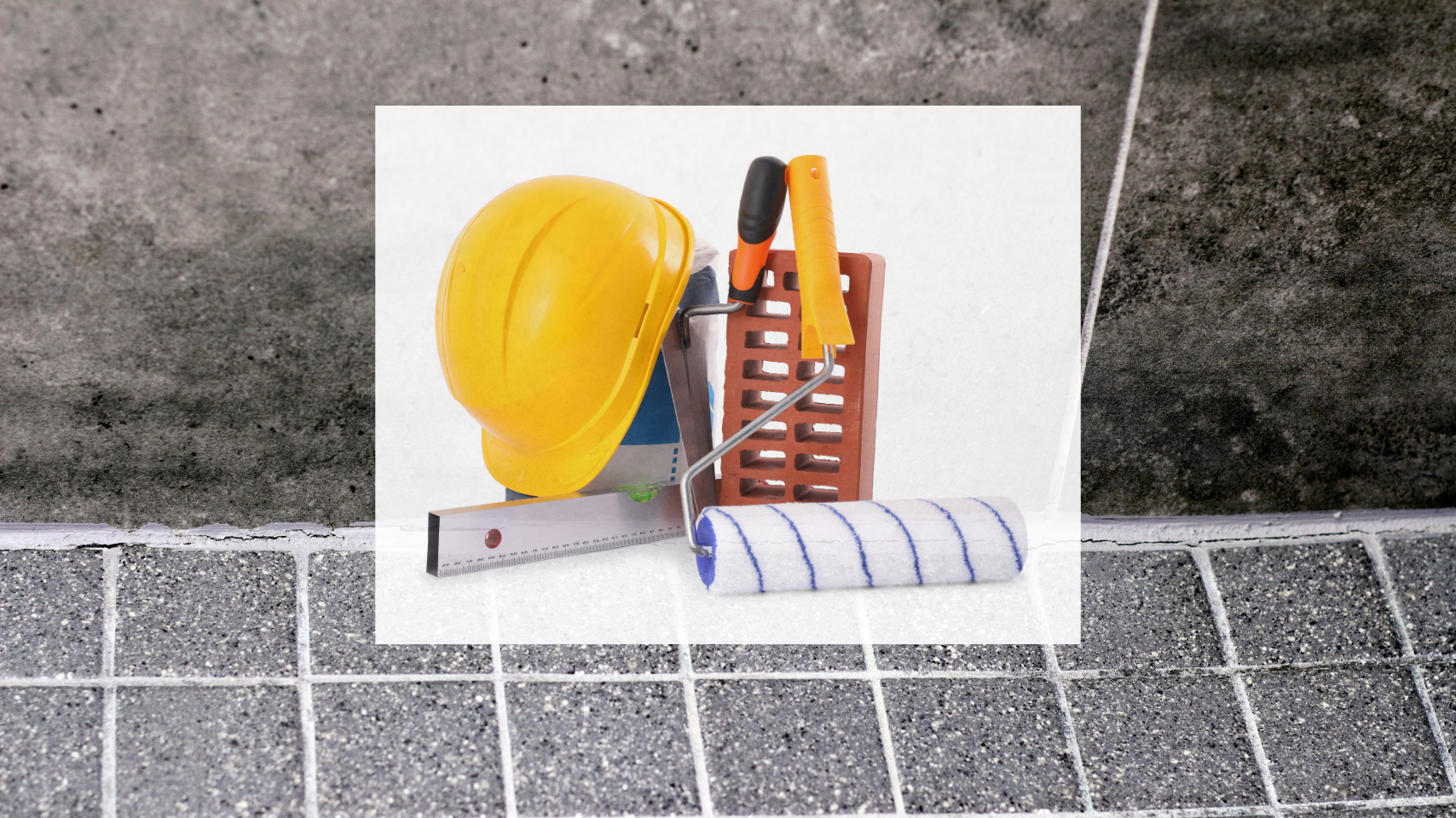 Construction tools including a yellow safety helmet, a brick, a T-shaped level, and a paint roller with a blue and white striped cover, placed on a white surface against a gray tiled wall.
