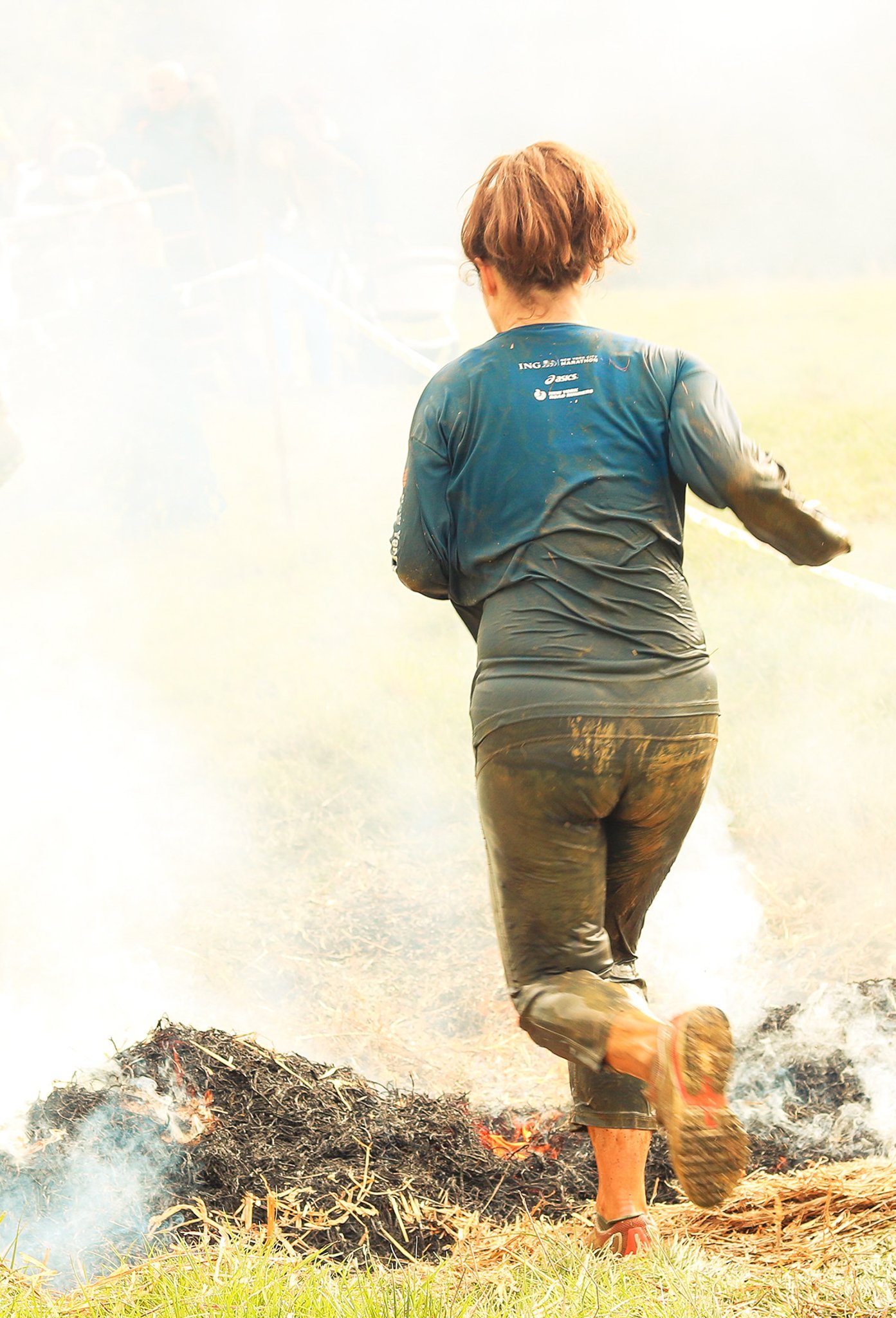 A woman about to walk over the fire at the Swanbourne Endeavour race