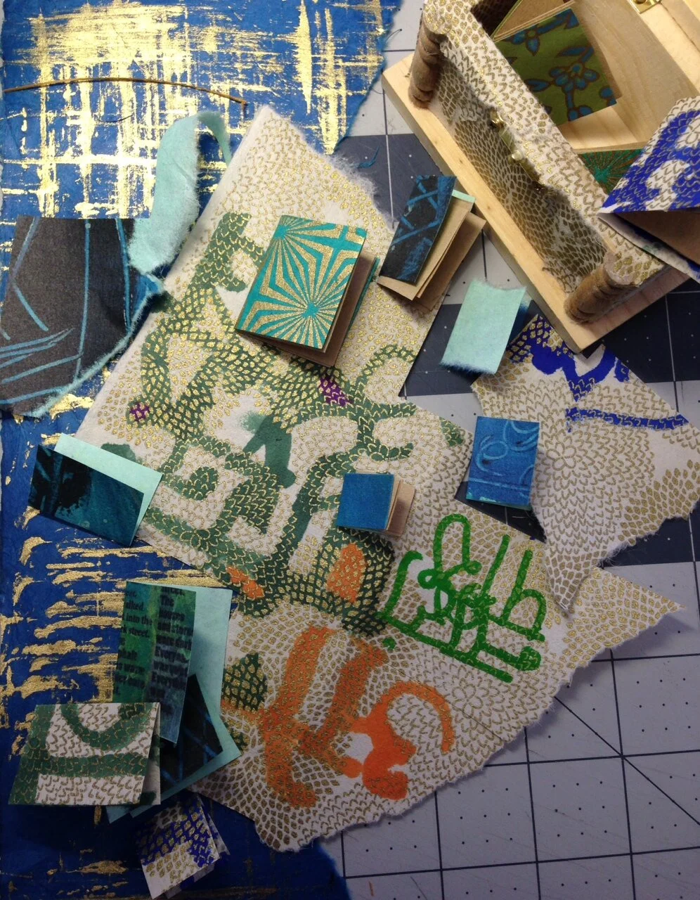 4. After I was done freaking out about what I didn't know, like what to do with boxes, I looked at what I already had all around me at the Studio. Papers, markers to write with, and  handmade books which held stories. And all sorts of other stuff. Go