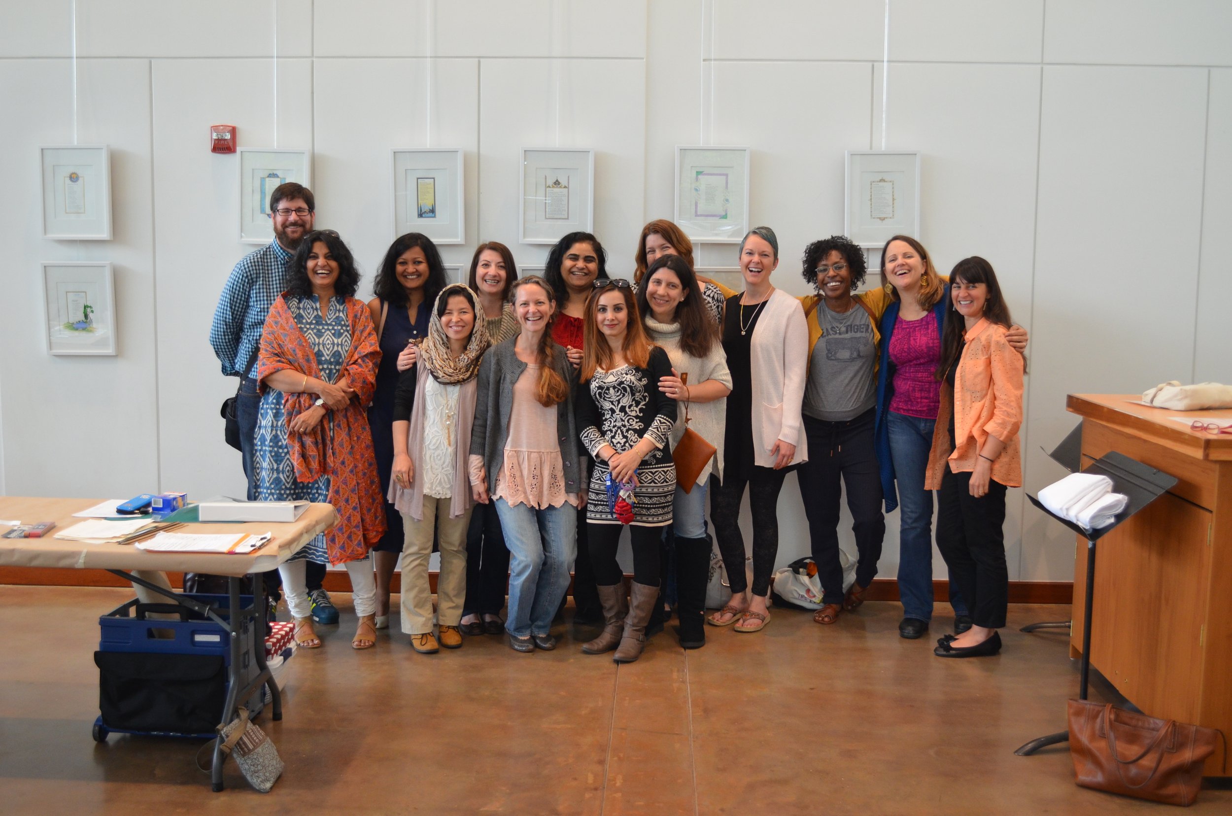 Most of the poets, Sughra, and Sushmita with the exhibit