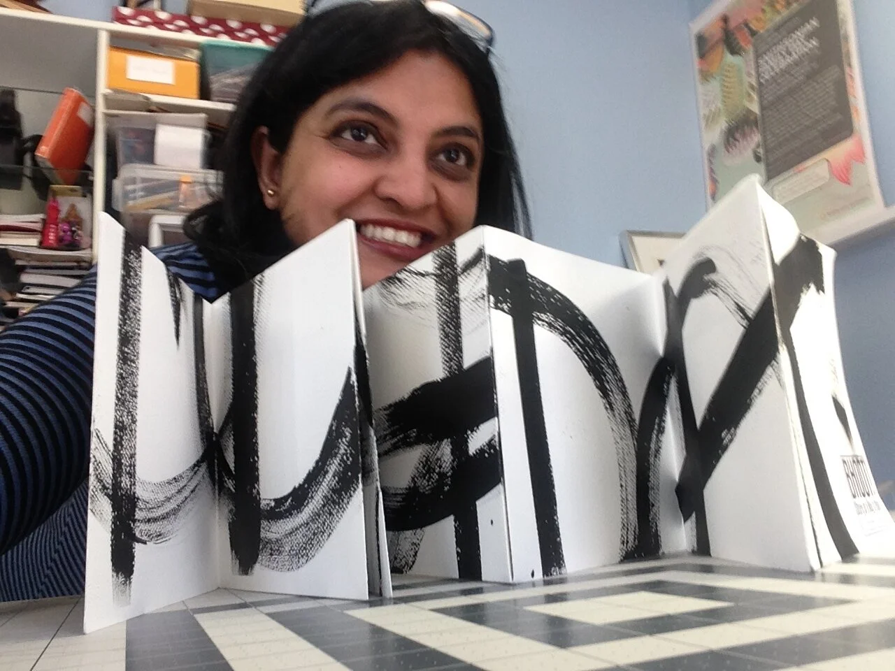 Sushmita with the open book in her first Studio location in S. Arlington.