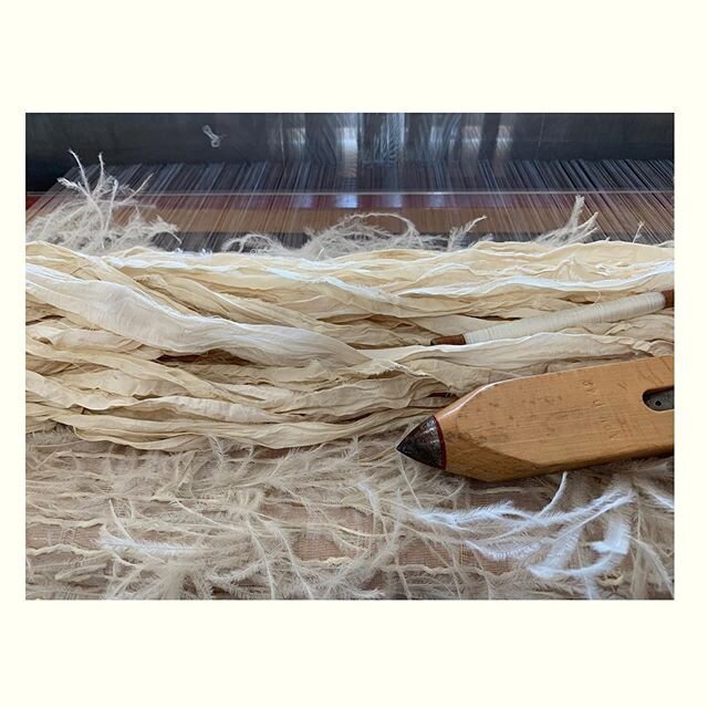 I&rsquo;m in minimal colour, expensive yarn, silk organza warp heaven.... finally #weaversofinstagram #couture #handwovencouturefabric #feather #silk