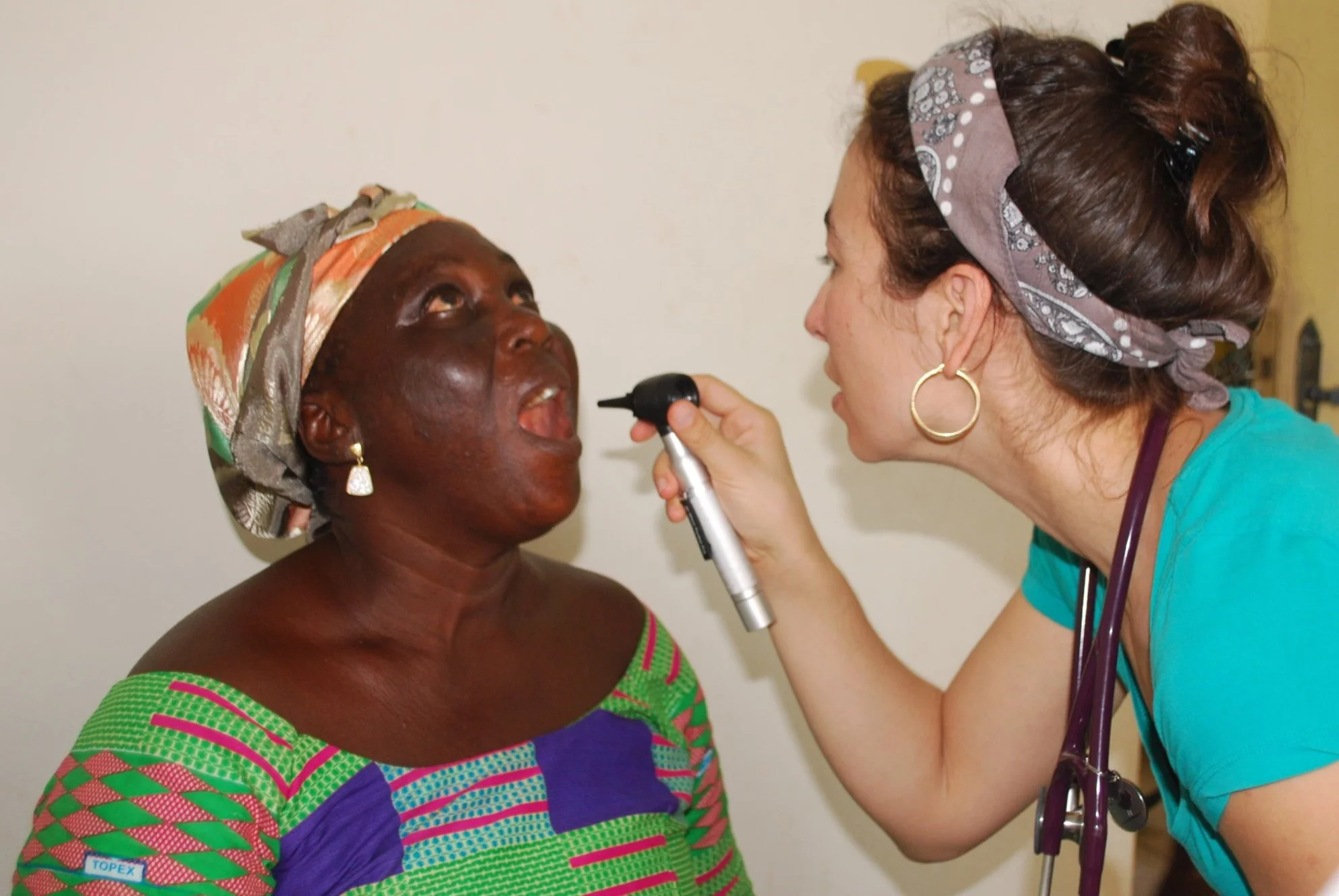 Dr. JillianSchroeder examining a patient on the trip to Ghana sponsored by Team Africa with Dr. Cindy Talbot (Faculty) and Dr. Evon Anukum Pharm D leading this trip.