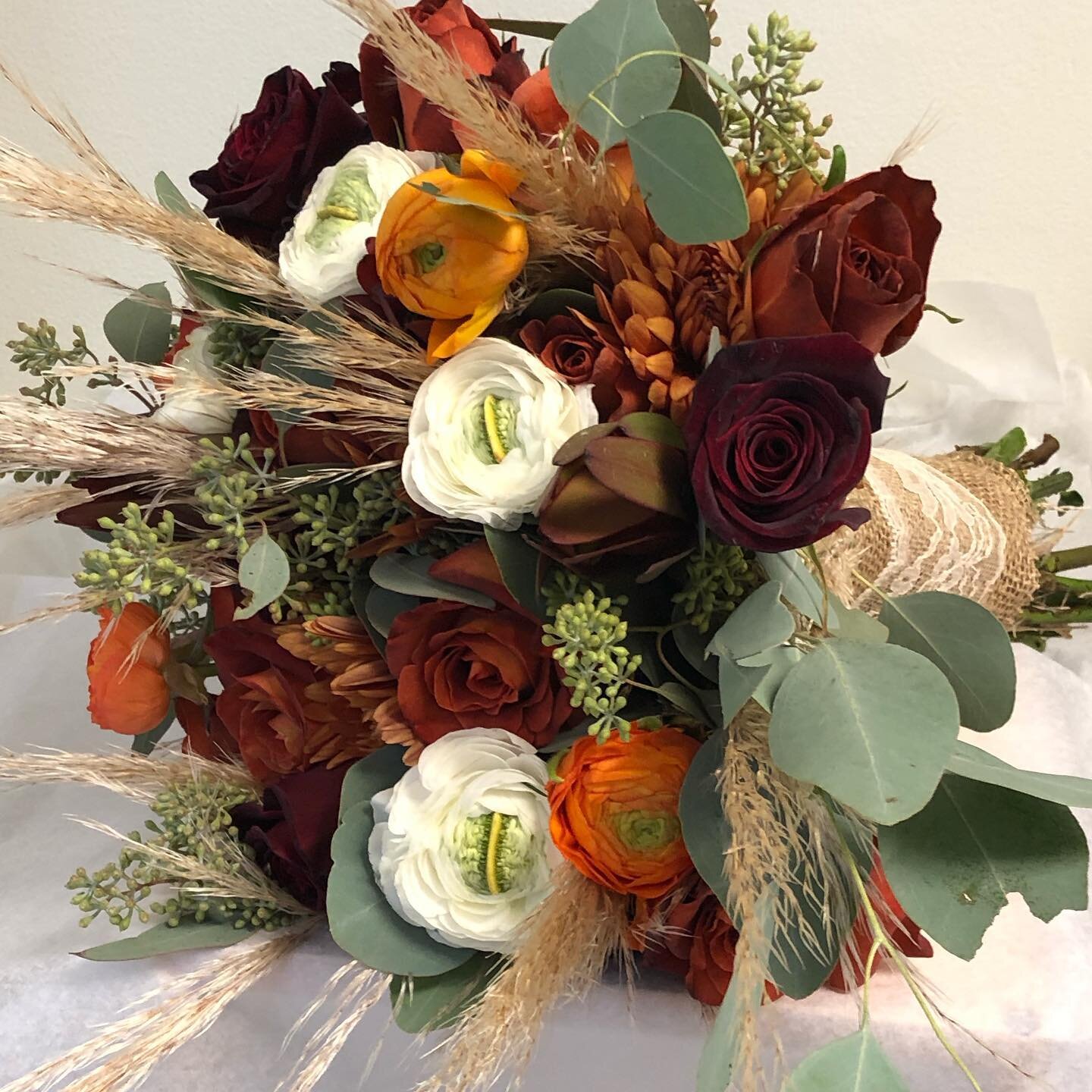 Fall color bridal bouquet #flowersbyburton #flowers #weddingflowers #bridalbouquet #pampasgrass #fallflowers #weddingflowers #liweddings #bridesoflongisland #theknot #weddingwire #blackmagicroses