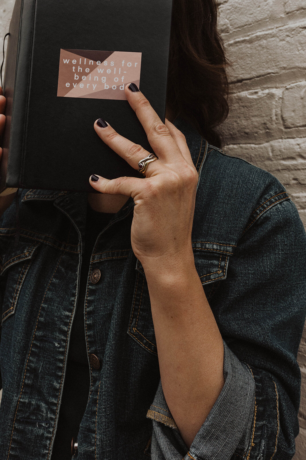 Wellness For The Well-Being of Every Body sticker on journal by Maven Made