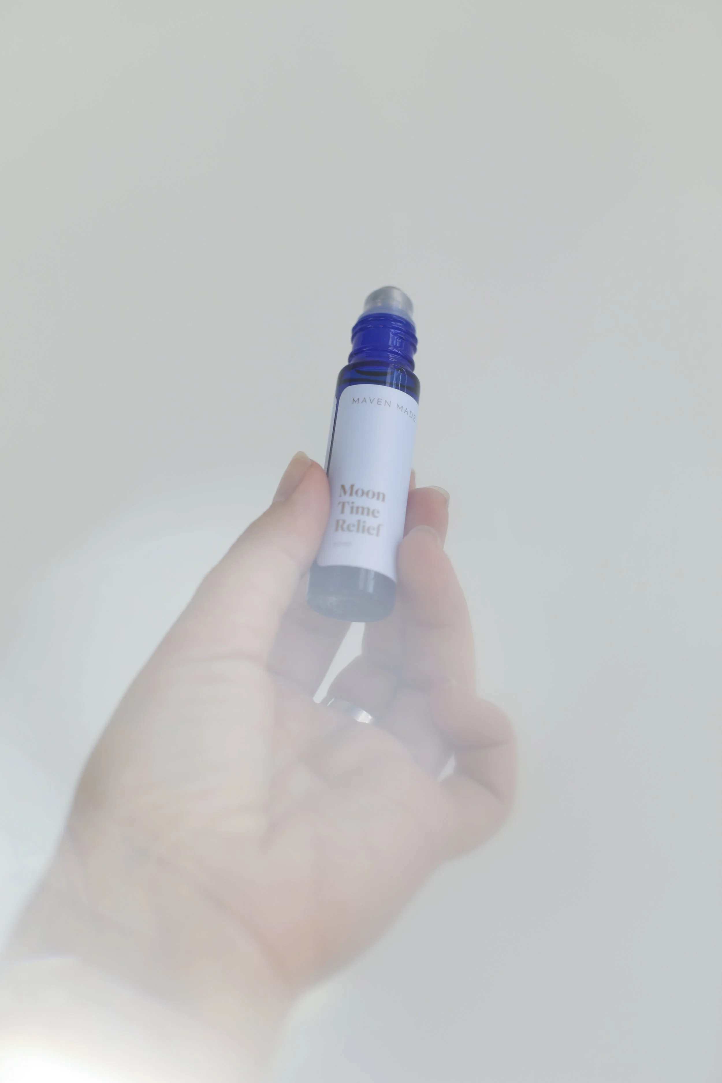Moon Time Relief roll by Maven Made in hand
