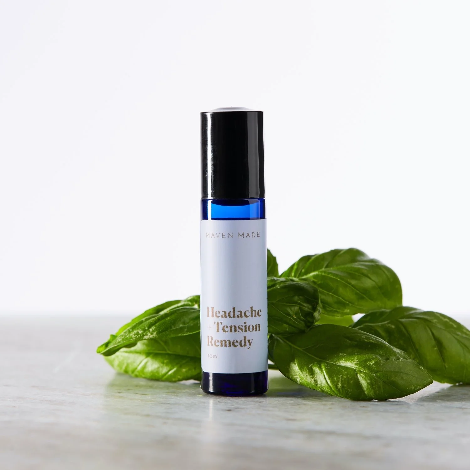 Maven Made Headache and Tension Remedy 10ml cobalt glass roll-on bottle with basil, lavender and peppermint
