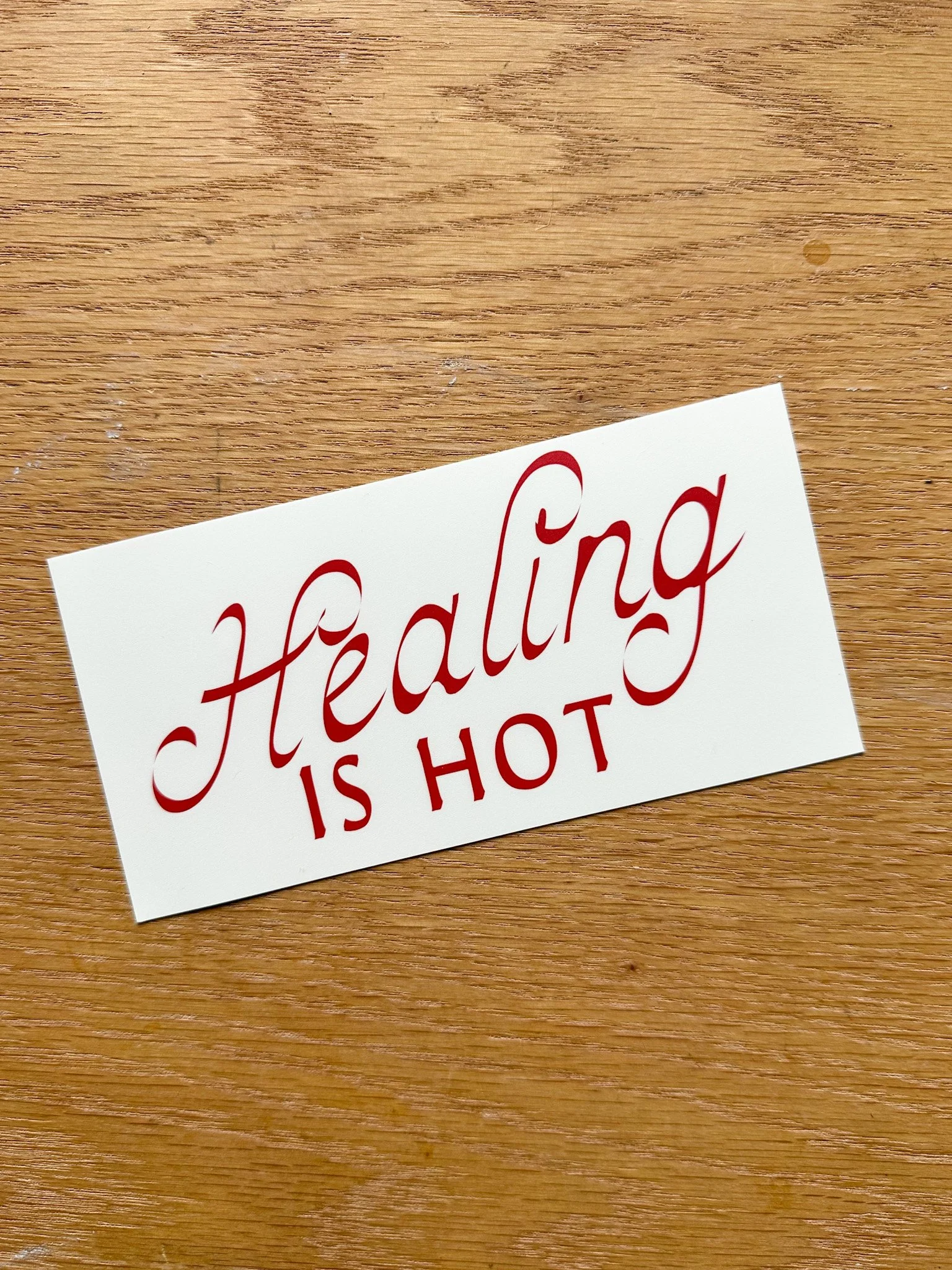 cream and cherry red Healing is Hot bumper sticker.jpg