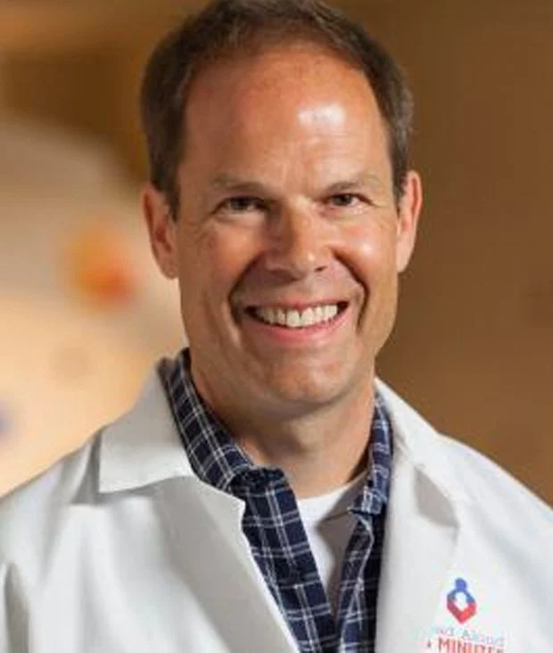 Hutton Color Headshot.jpg