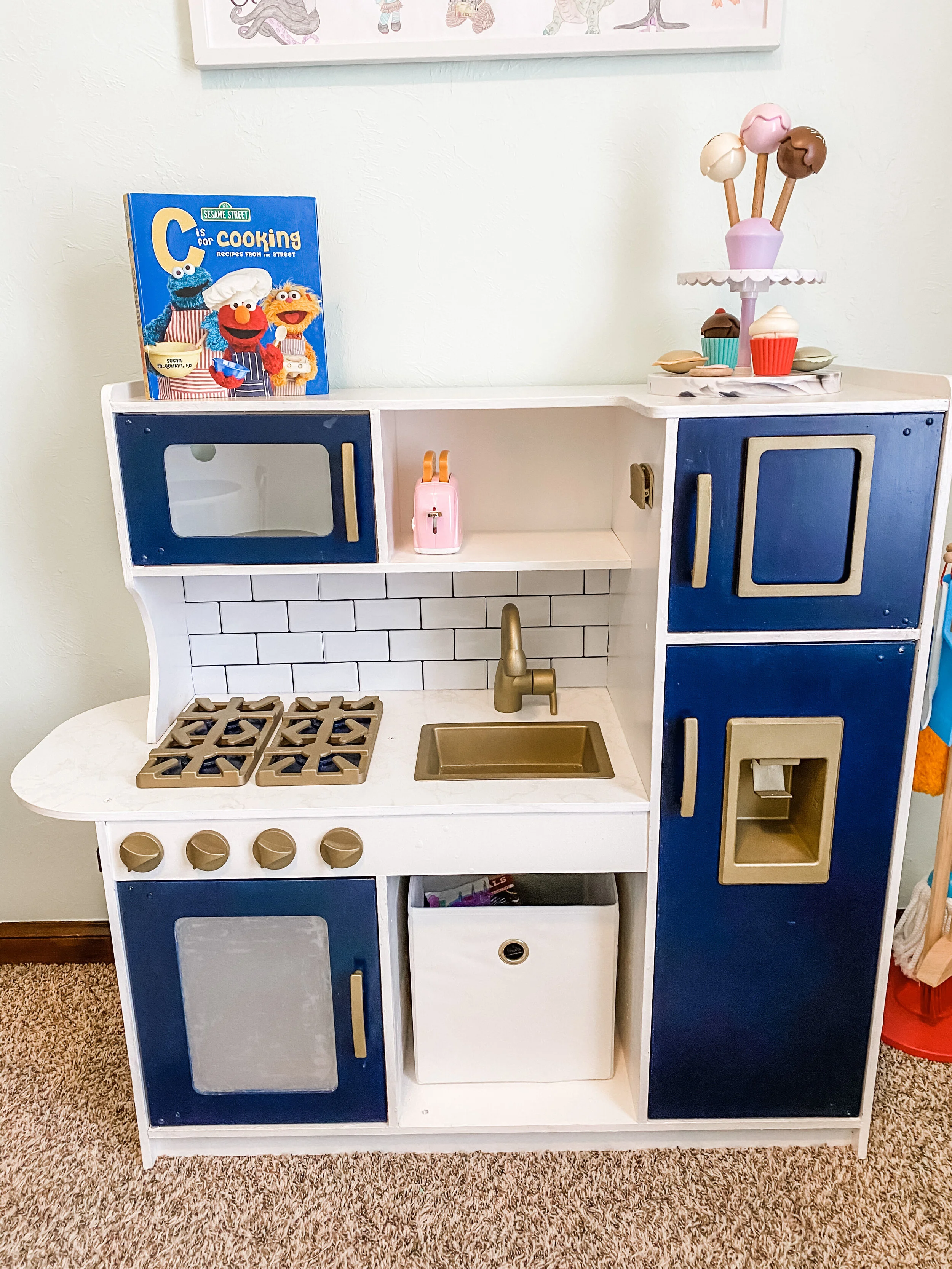 Play kitchen’s are a big piece of furniture that stand out in a room. Scarlett’s play kitchen was a generic gray and black. We elevated it’s style by painting the kitchen and adding trendy subway tile. Now, it’s a beautiful element in the design!