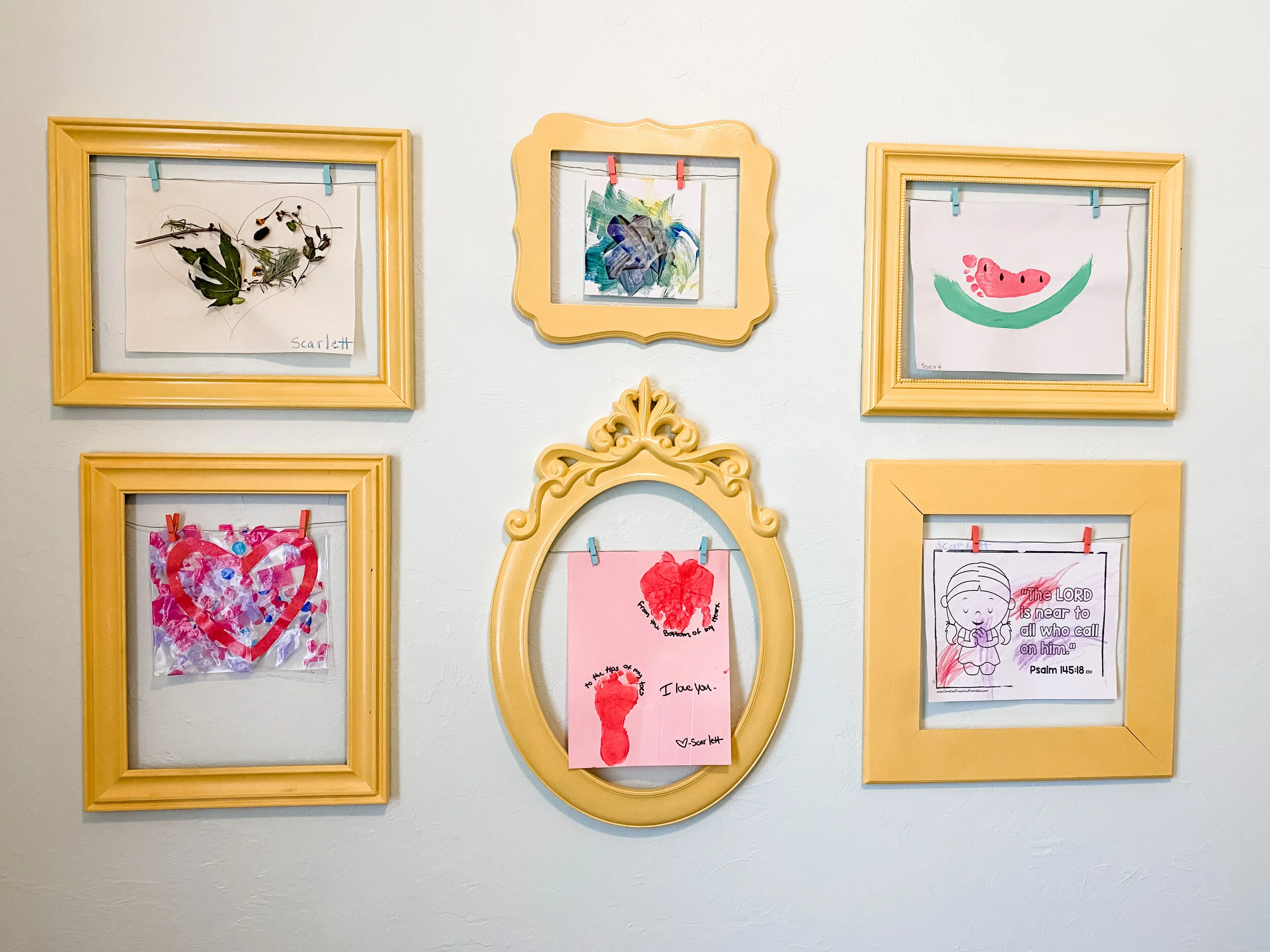 Every child needs a place to showcase their art. I painted the frames and added wire and clips to give Scarlett a fun display that is easy to change when she creates!
