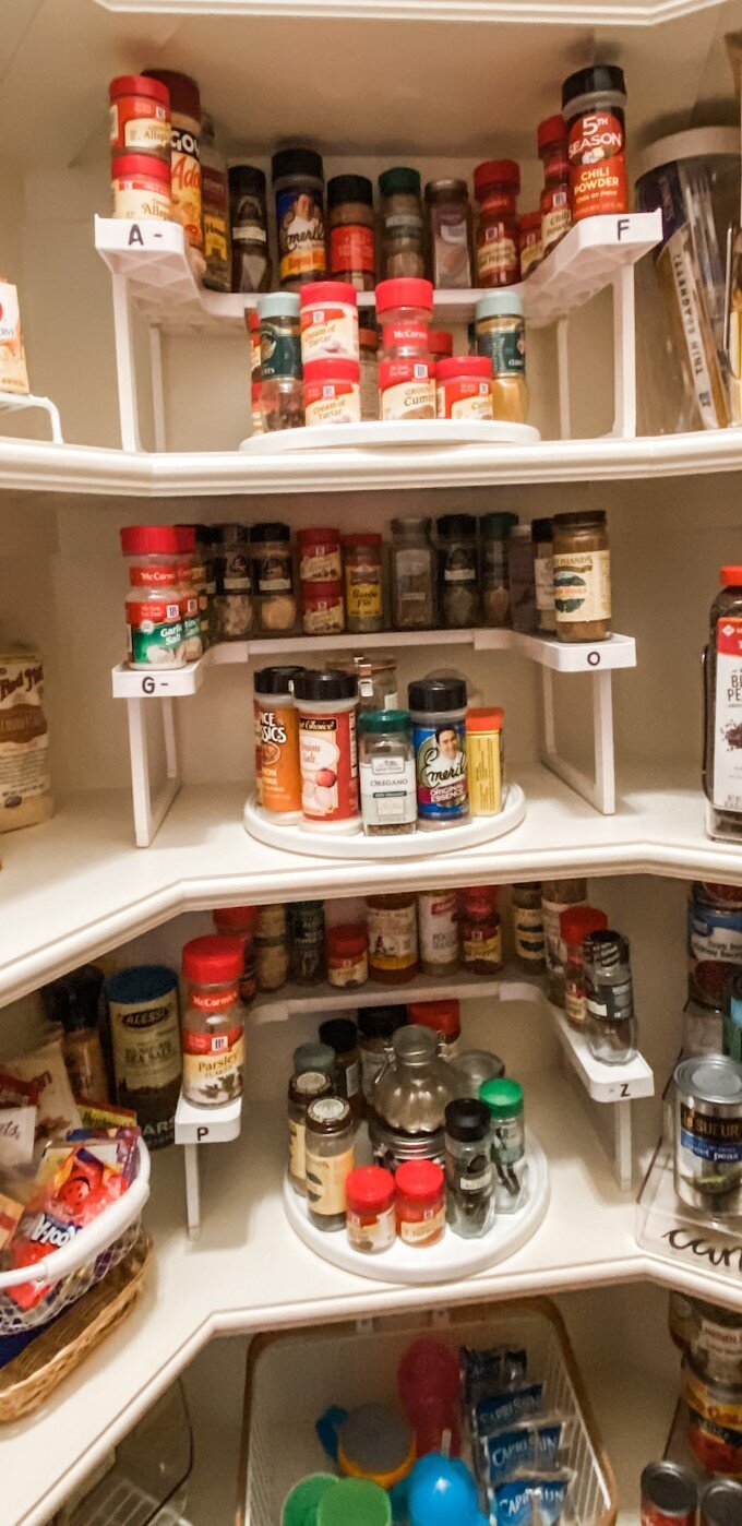 Before there were spices everywhere in several different racks. I purchase the same expandable rack and used Lazy Susans to clean up the look and make it easier to find what you are looking for. The spices are in alphabetical order and all facing th…