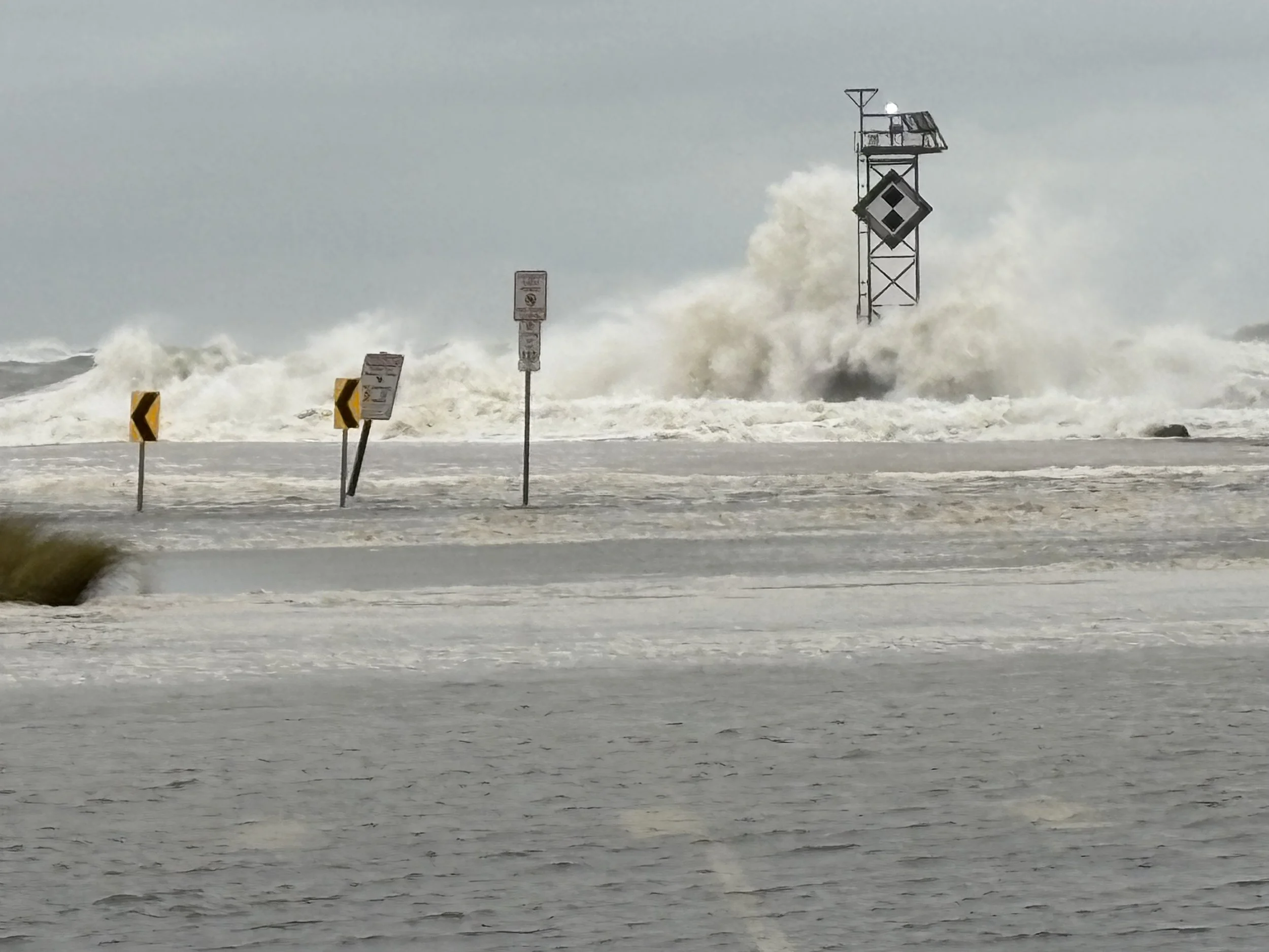 People's Choice Winner: "Big Waves Flood Ocean City, Md. Beaches" by George Leukel. Description: Big Storm Passing By Ocean City Floods Beach and Inlet Lot.. Number of Votes: 250
