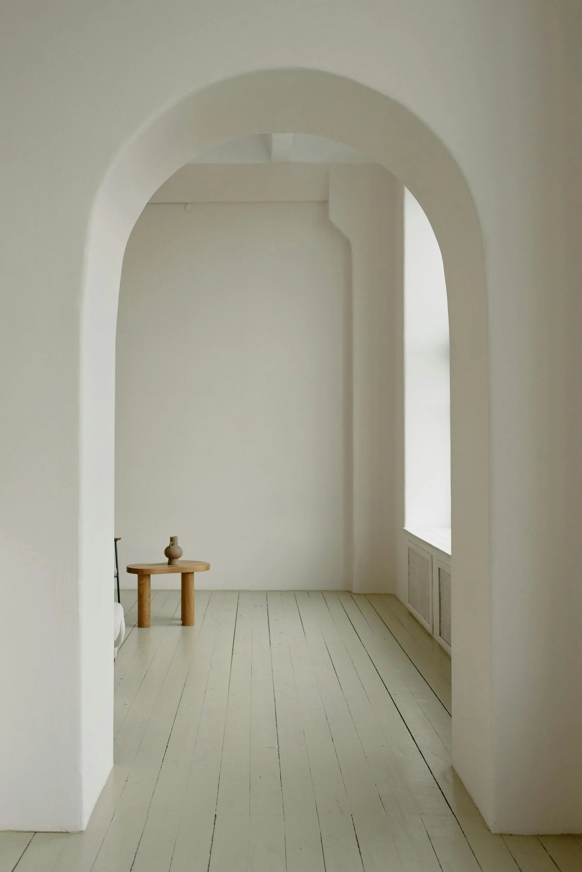 Calm, minimalist therapy space with soft light and neutral design.