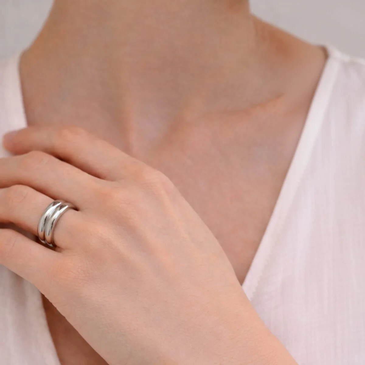 nike-silver-ring-model-close-up-hand-minimalist-jewelry-klimbim-barcelona-1200x1200.jpg