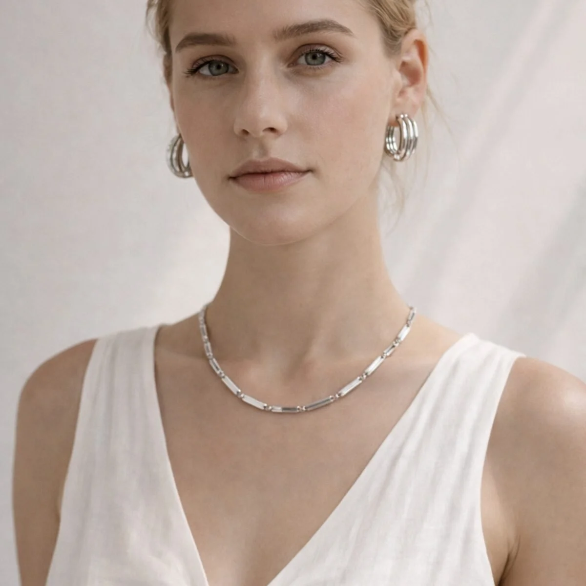 Hydra-Necklace-Silver-and-Nike-Big-Earrings-Silver-Model_1500x1500-1200x1200.jpg