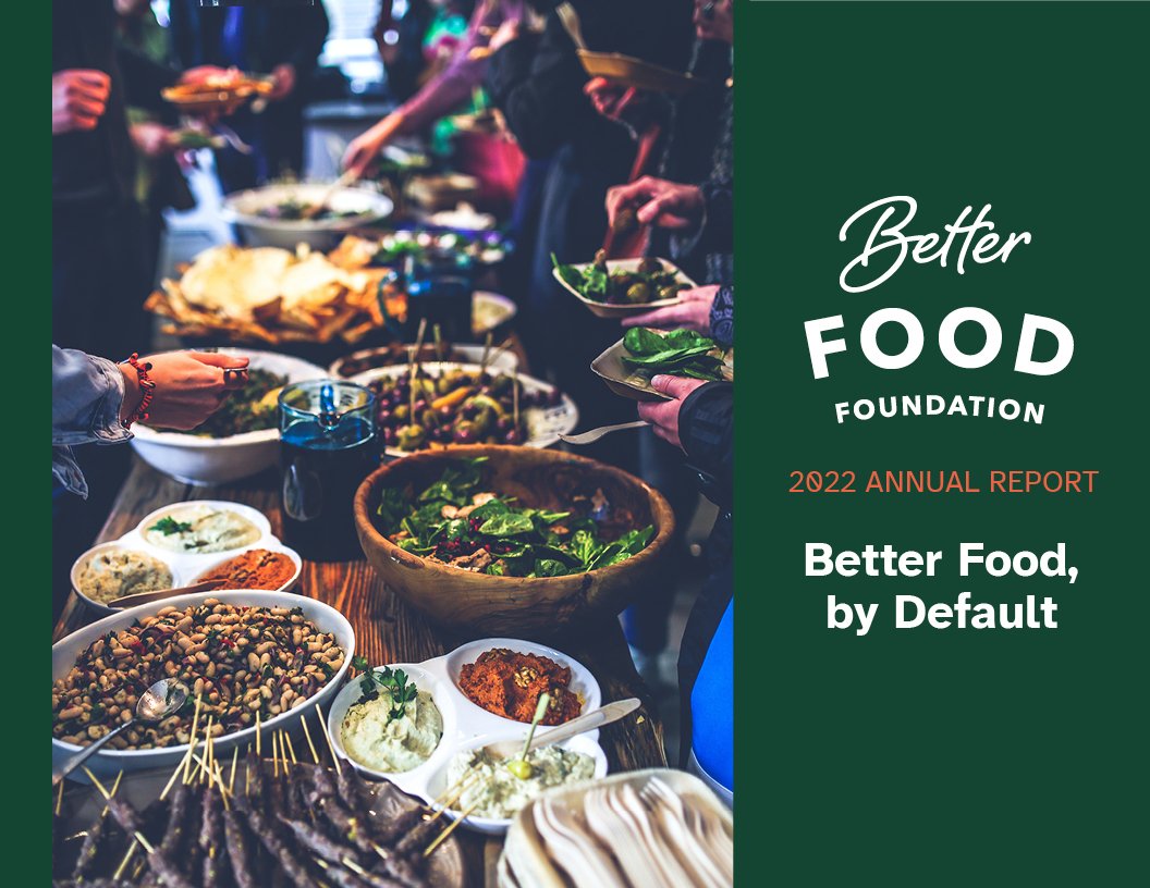 Annual Report Cover for Better Food Foundation with A diverse table of food with bowls of salads, dips, and snacks at a community gathering or buffet.