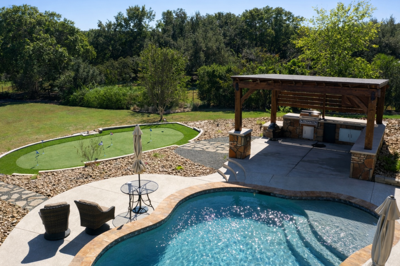 A backyard scene featuring a swimming pool, a putting green with several golf holes, lounge chairs with umbrellas, a stone house, and a large sign indicating a five-star rated pool.