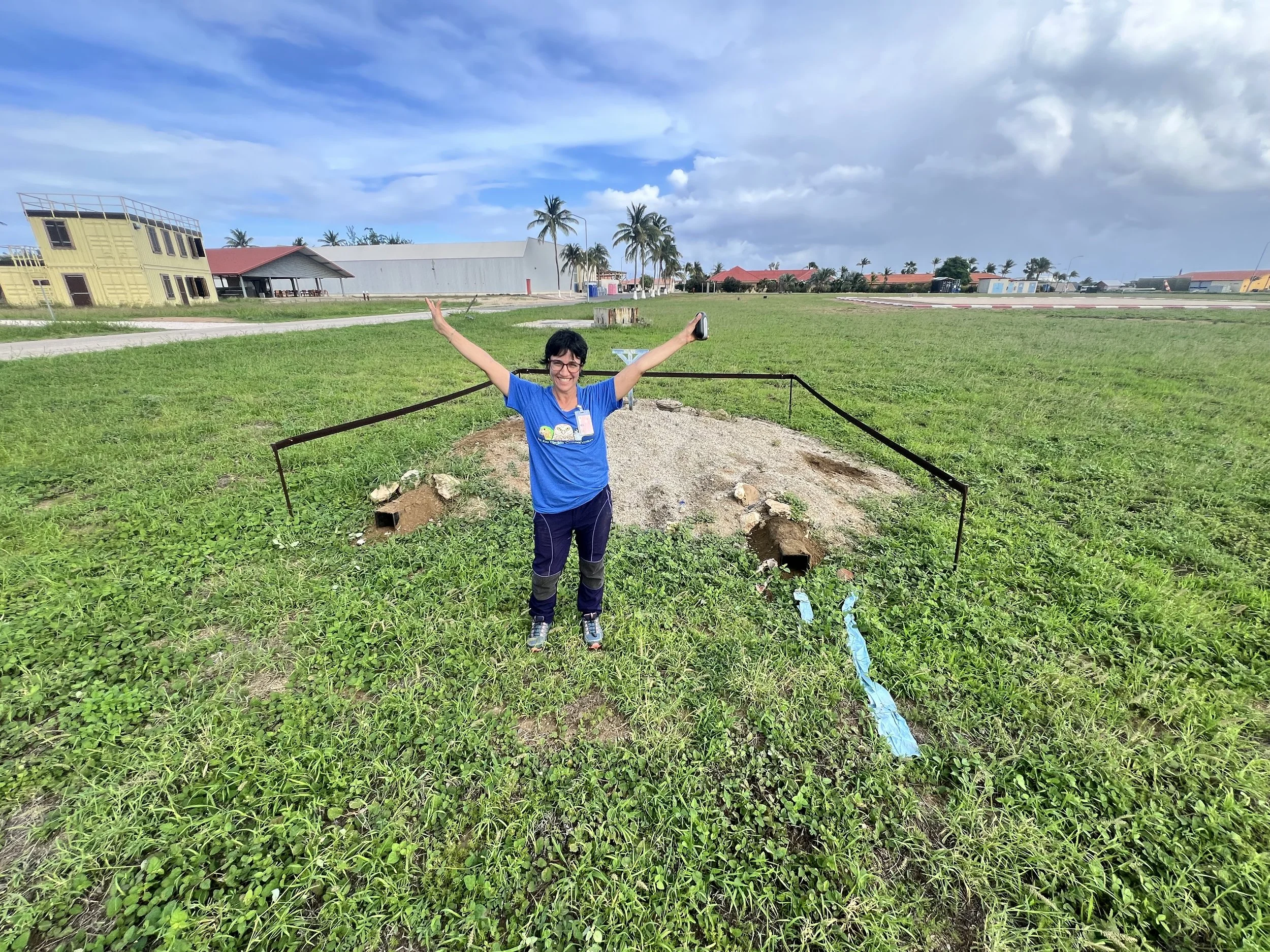 Anahi standing proud next to an artificial BUOW site in Aruba. 