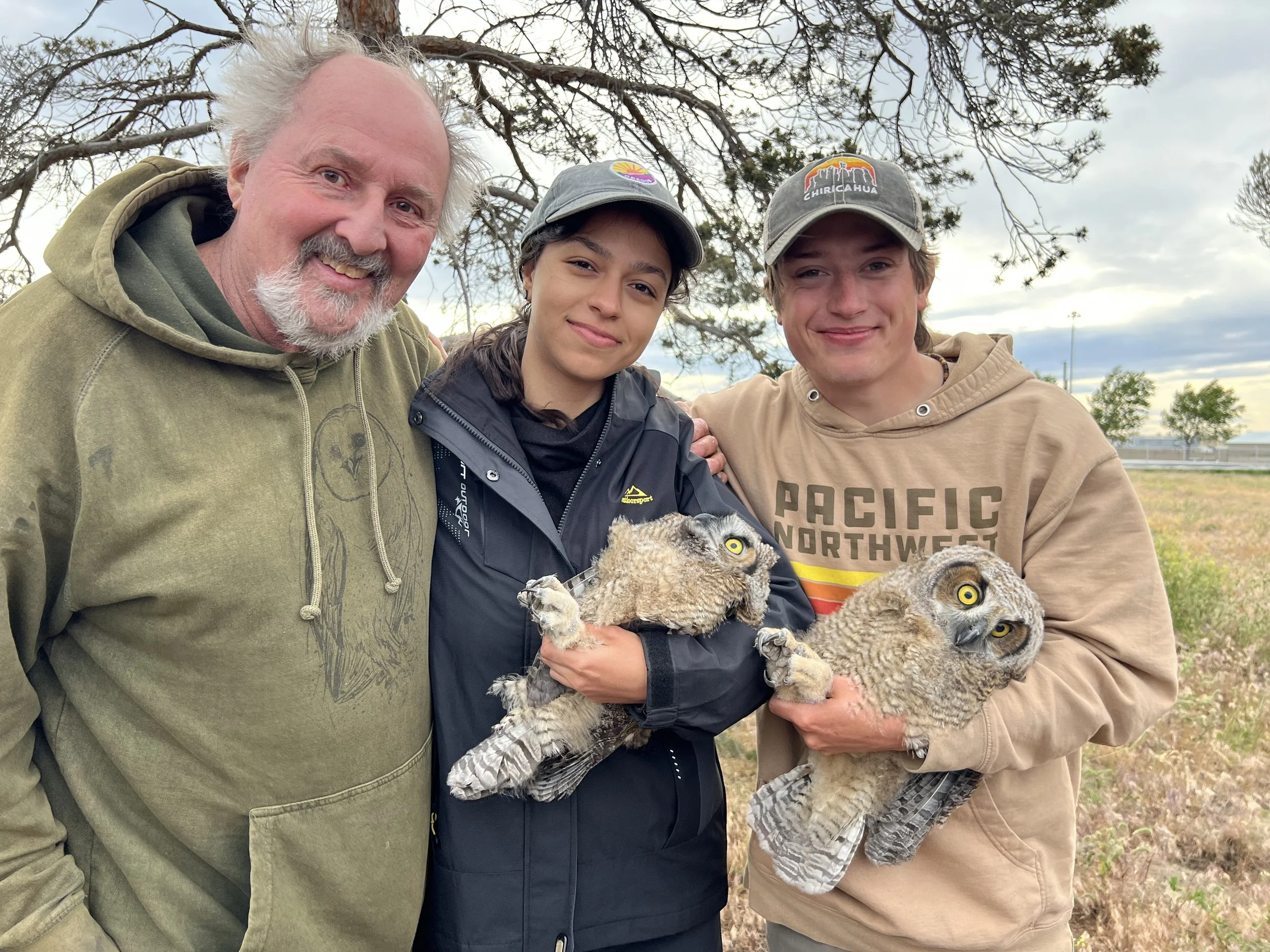 DJ, Gabriela, and I with two GHOW nestlings.