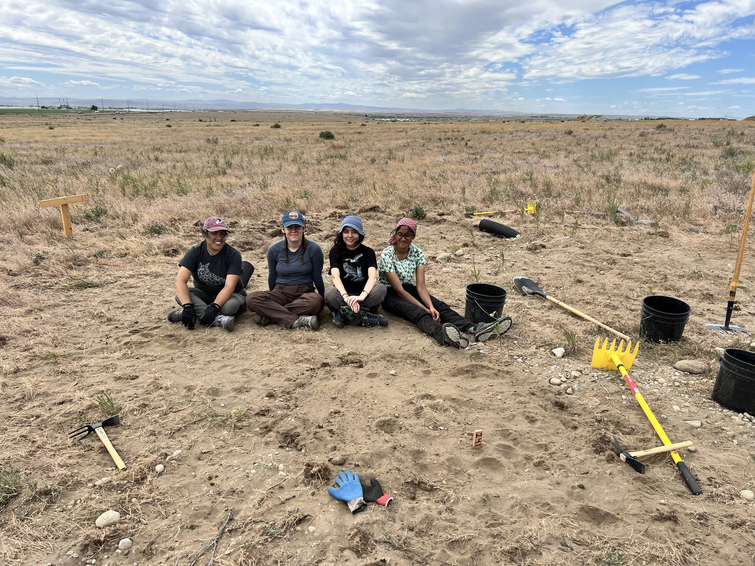 Priscilla, Clara, Elif, and Mala taking a break while installing a new site. 