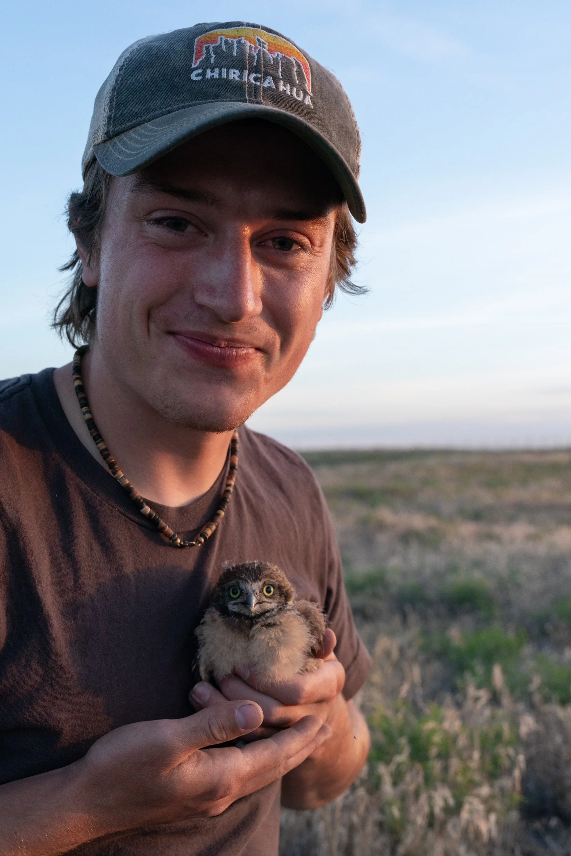 A lovely photo of a BUOW chick and I thanks to Clara!