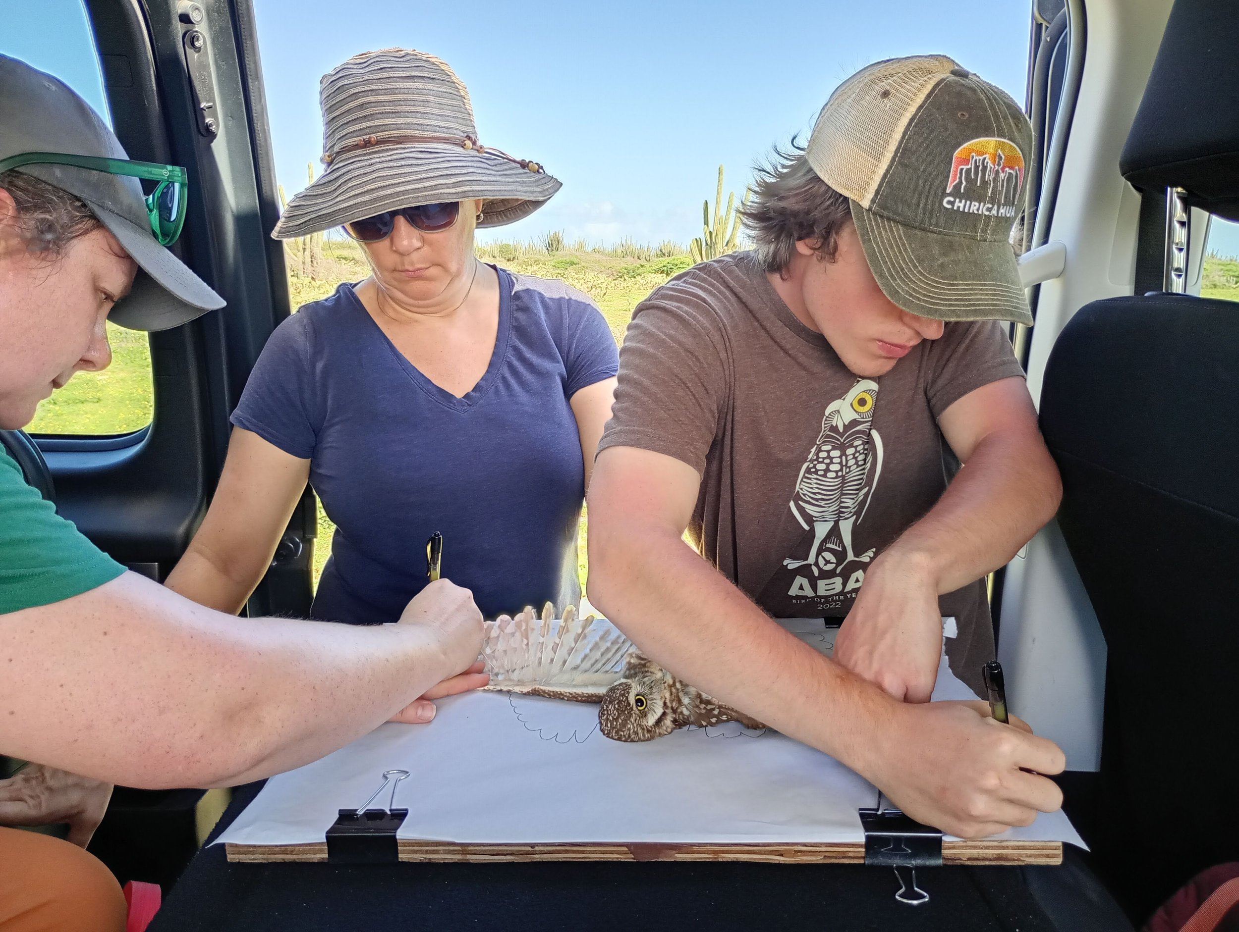 Lauren, Lia, and I measuring wingspan. 