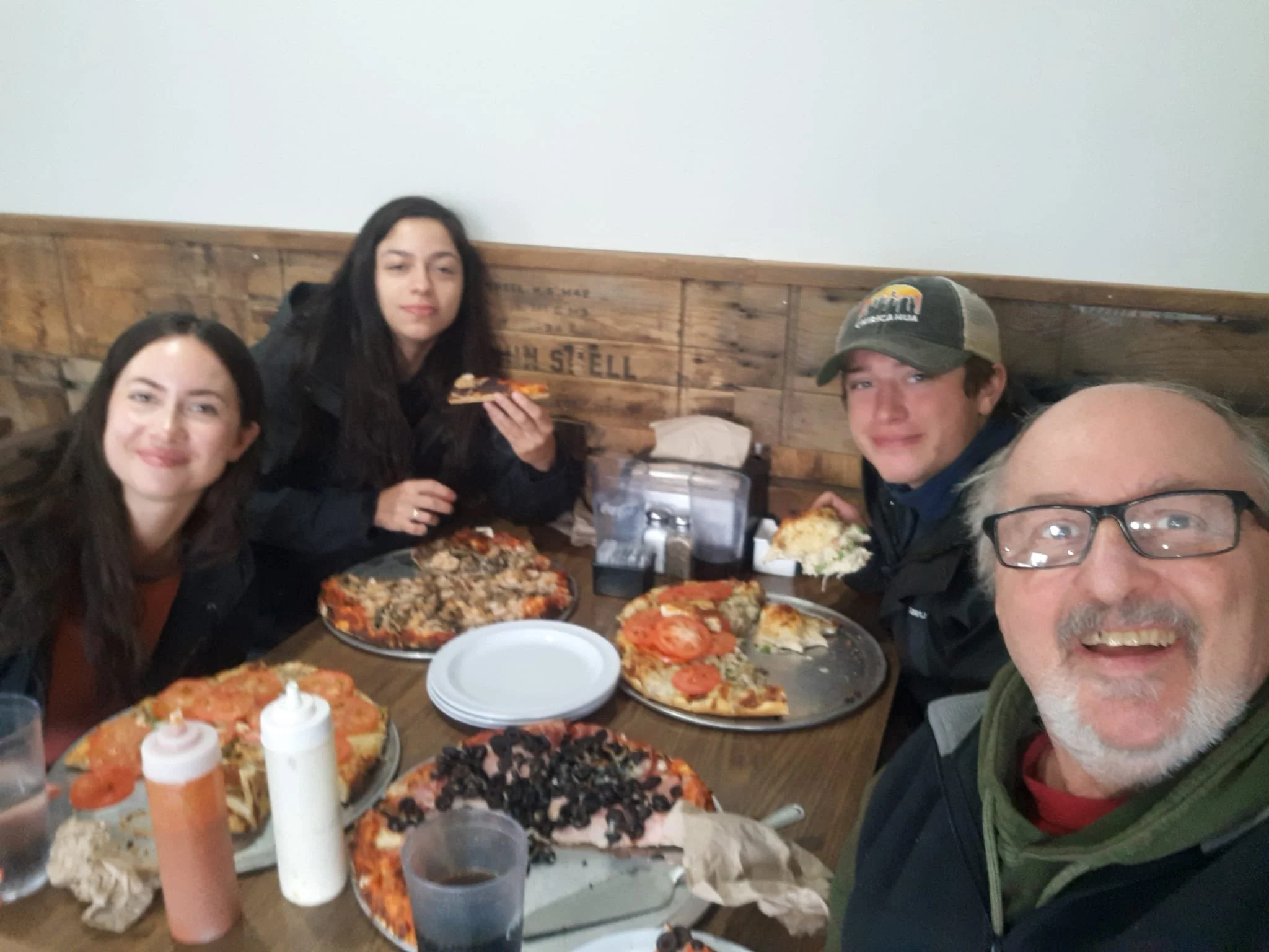 DJ and the core team eating pizza!