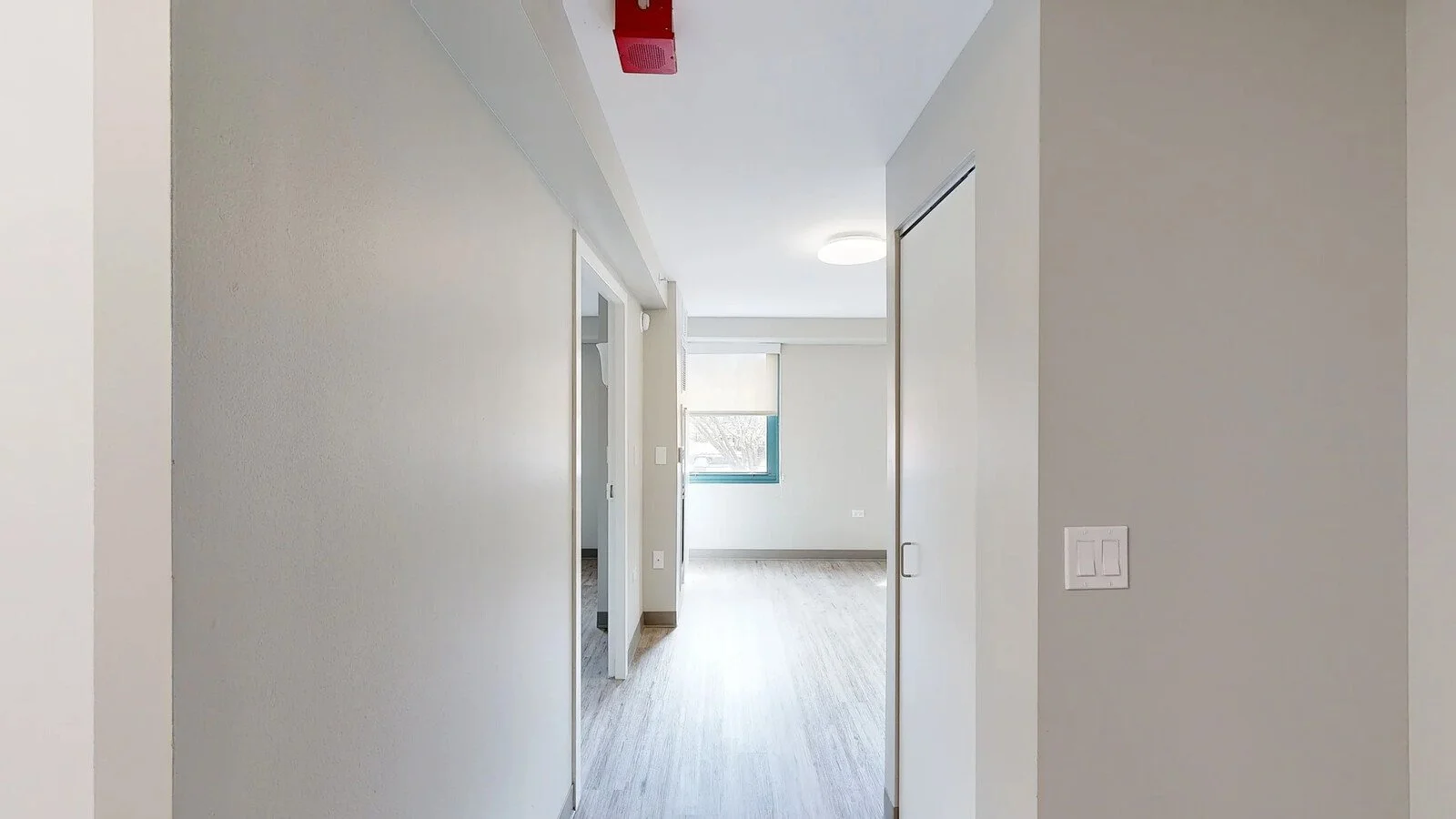 Magiglide bifold closet doors in Edith Spurlock Sampson Apartments, Chicago Housing Authority.