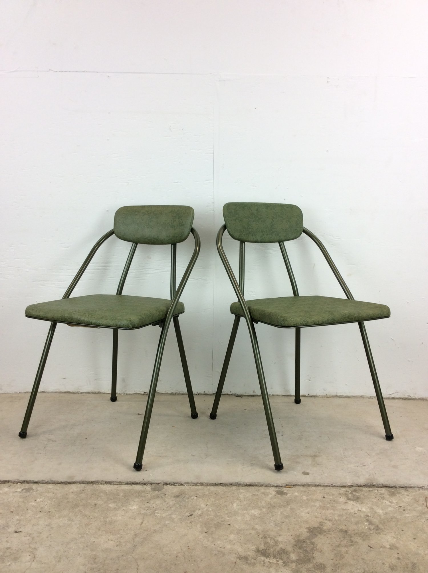 Mid Century Modern Pair of Green Vinyl Folding Chairs by