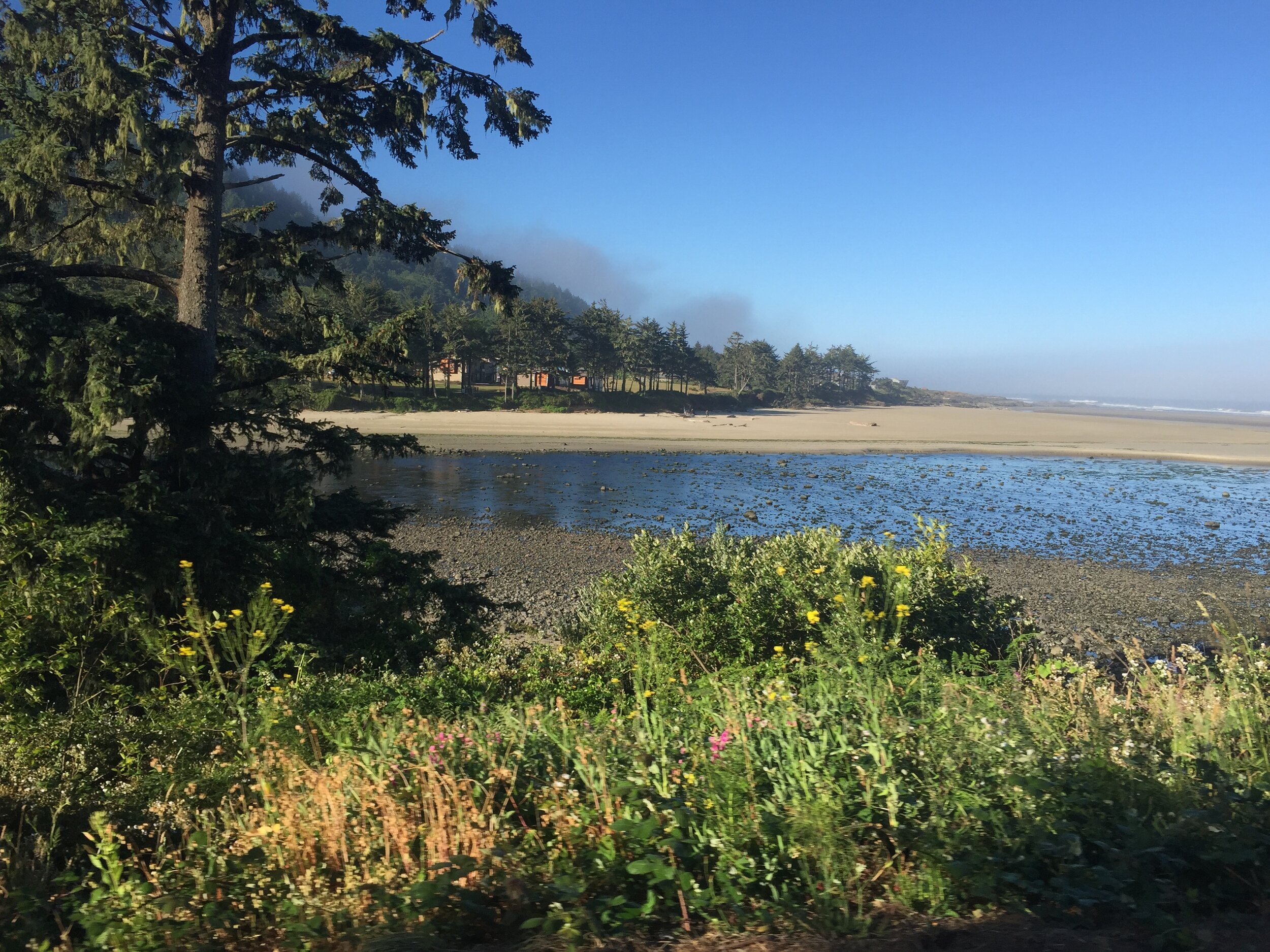 The Yachats River meets the Pacific.JPG