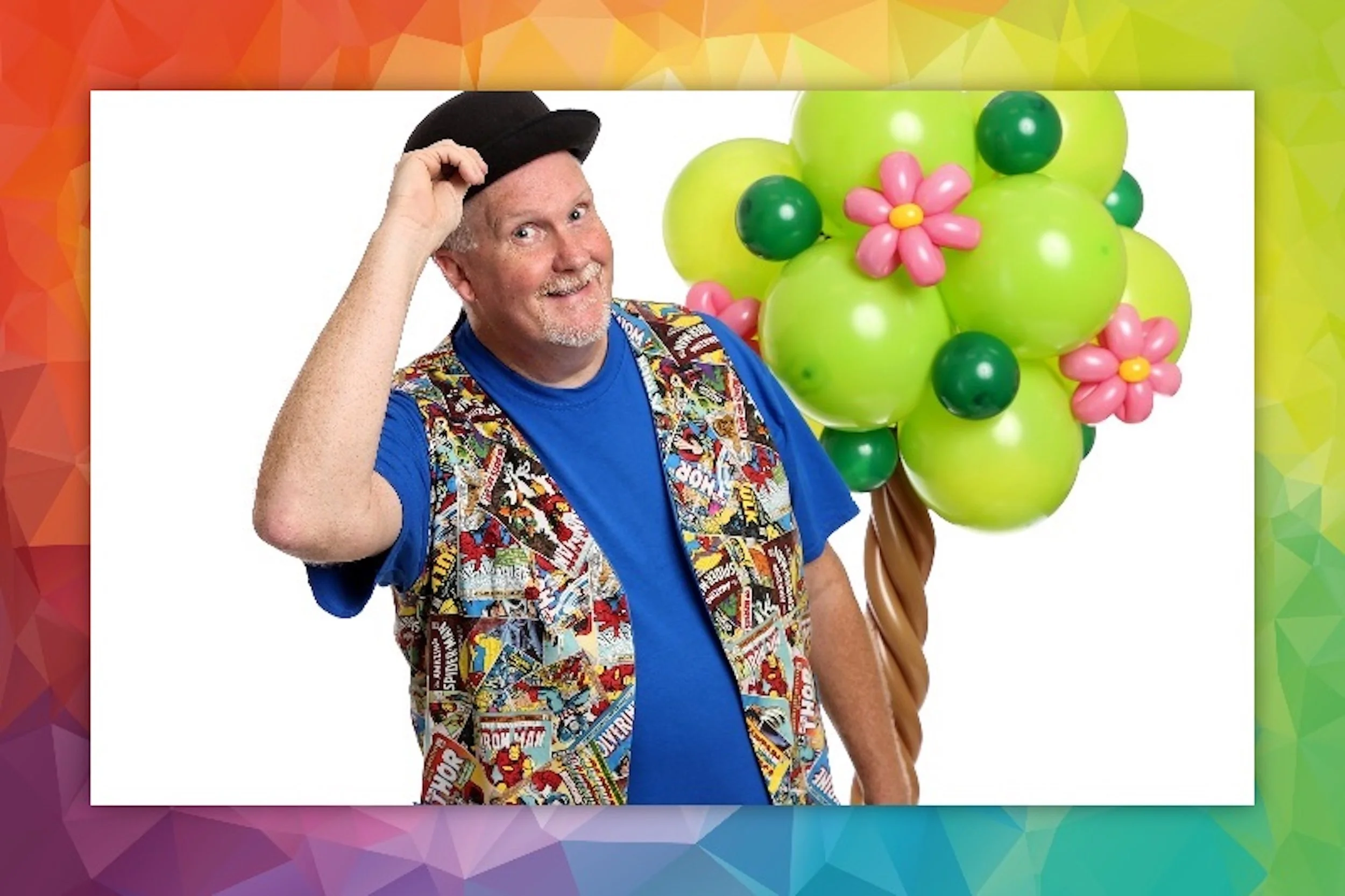 Brett Belleque with rainbow frame.jpeg