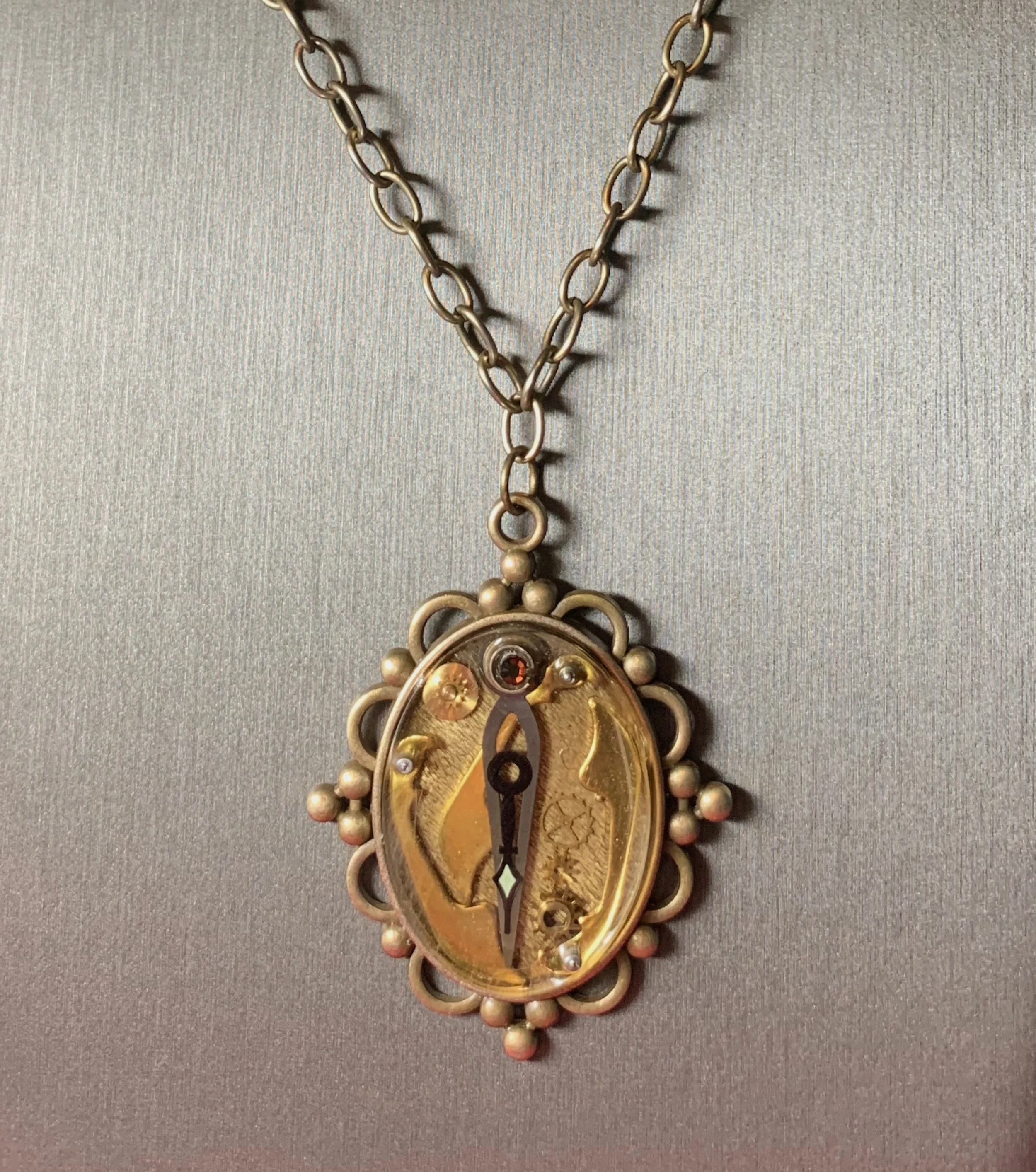 Sherry Secreast resin steampunk jewelry piece.jpeg