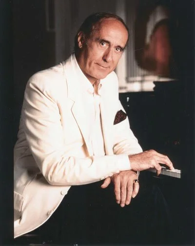mancini-color-seated-at-piano.jpg